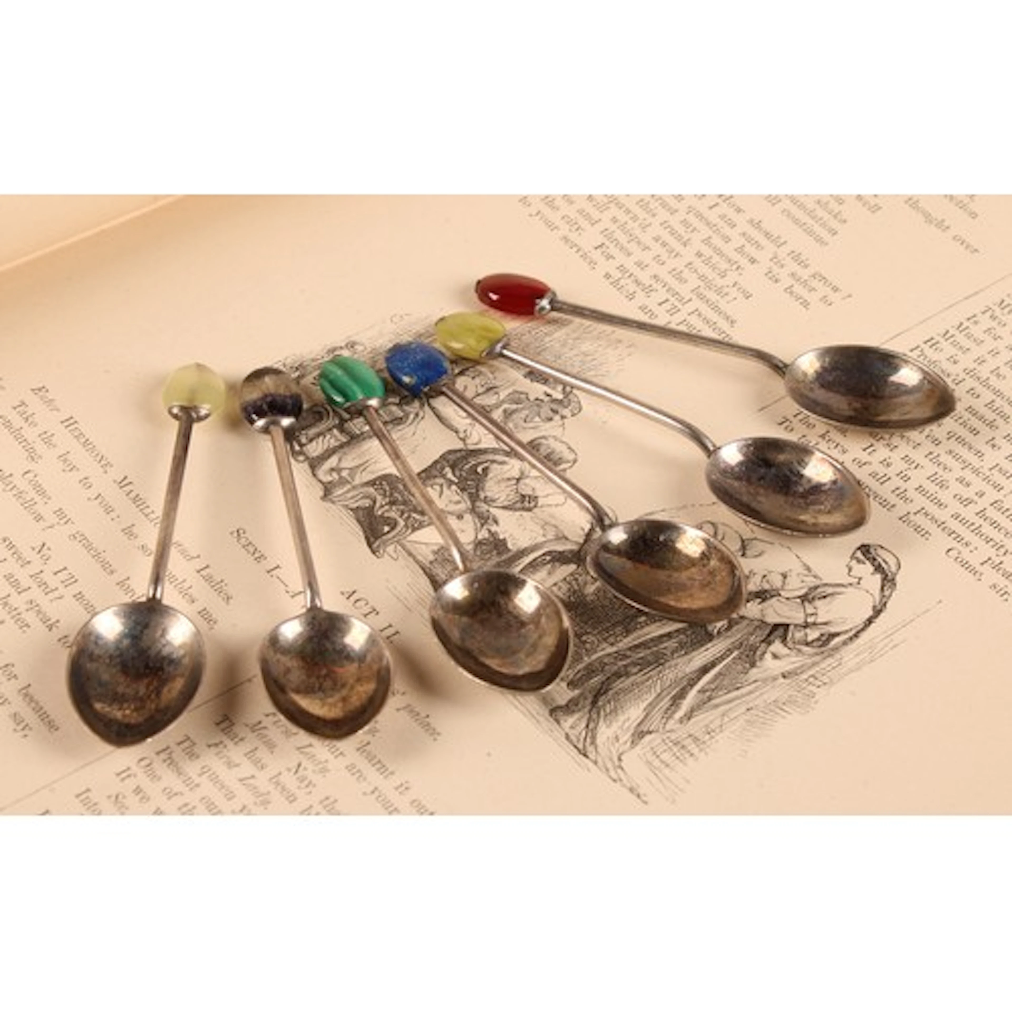 Liberty & Co - a set of six Arts and Crafts silver tea spoon...