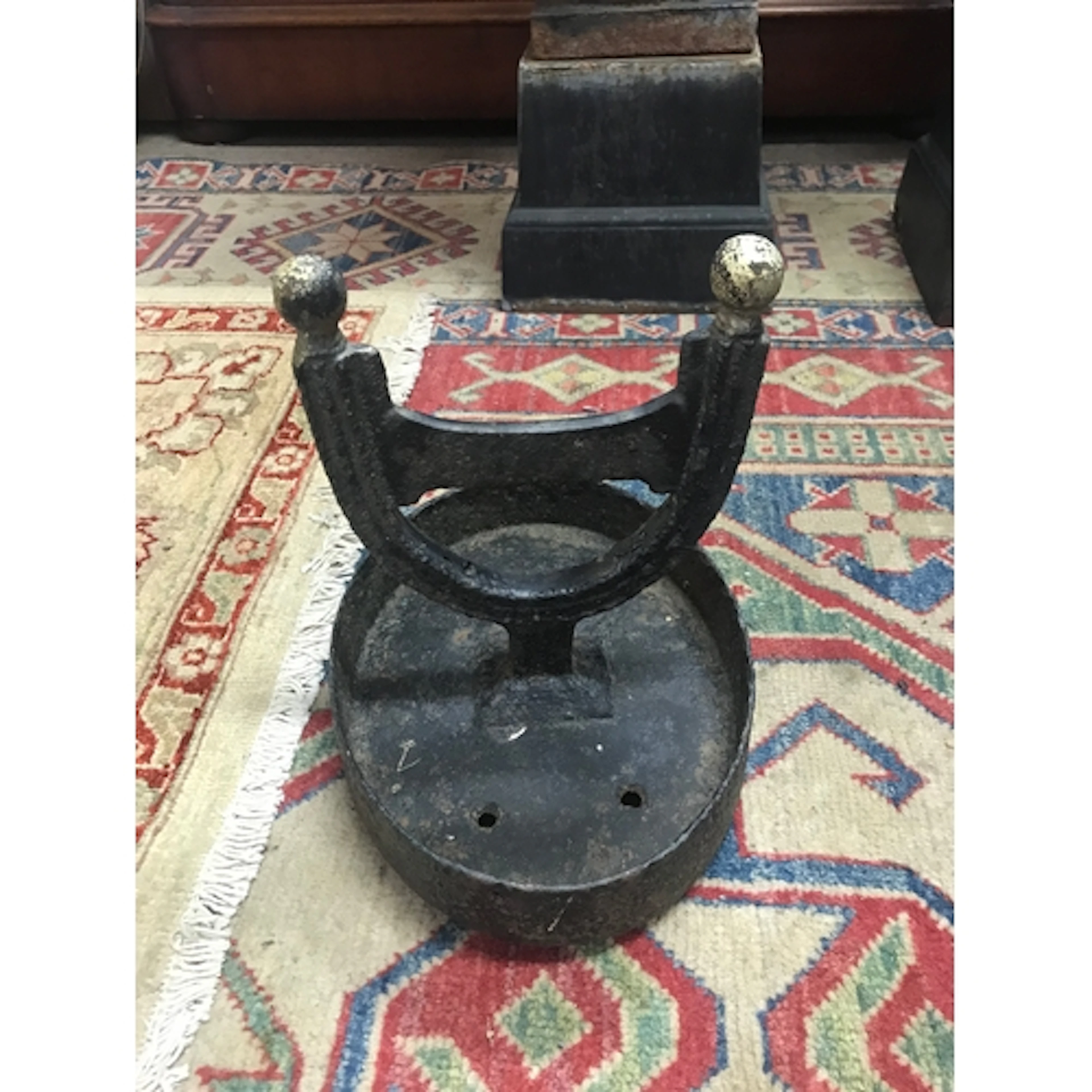 Two cast iron foot scrapers