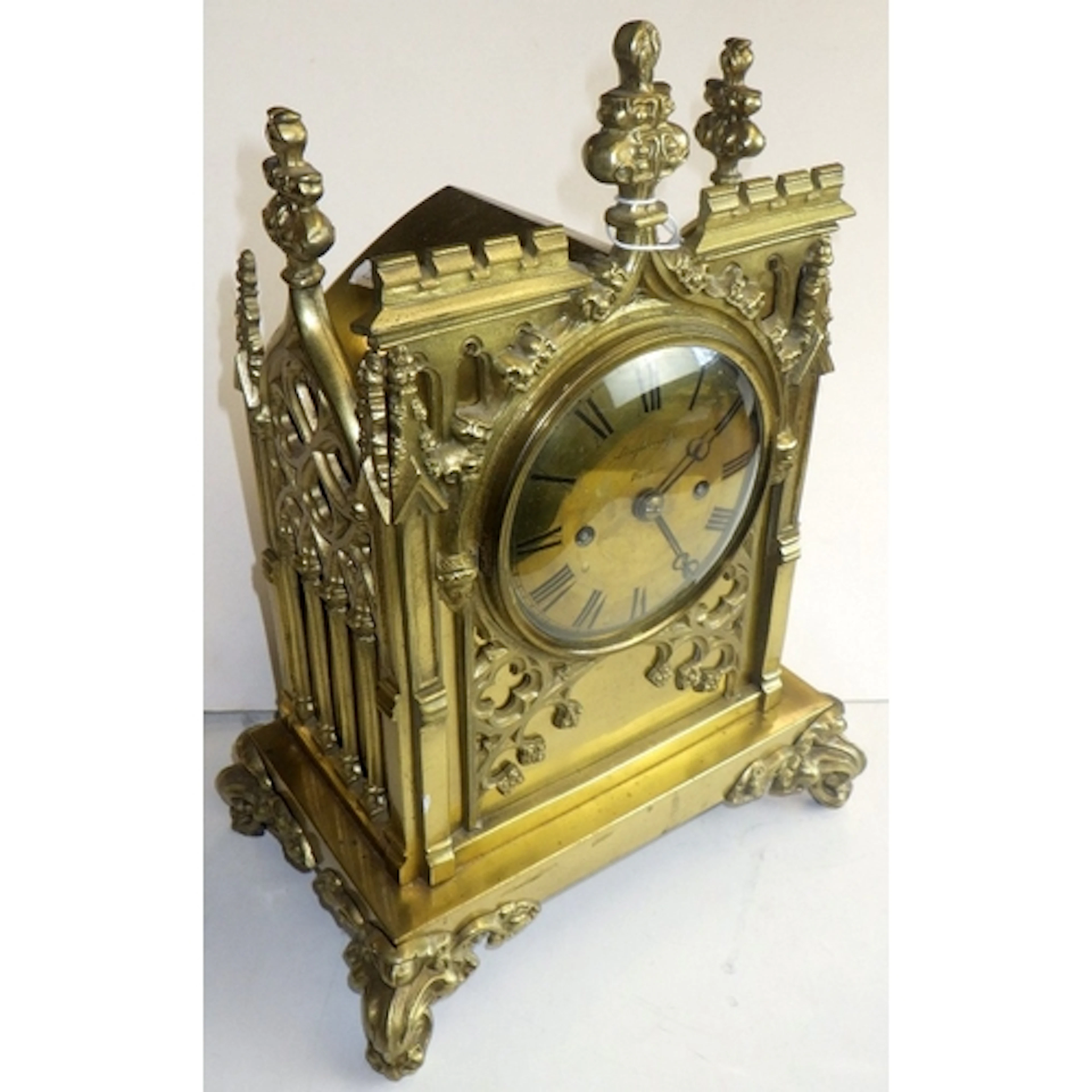 A brass Gothic Revival Fusee mantel clock AF, missing back f...