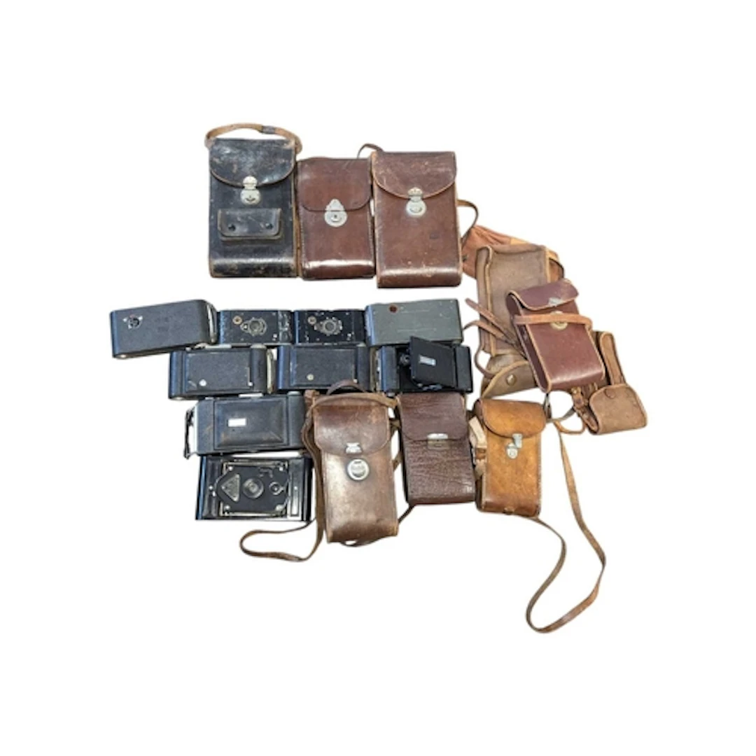A large collection of 20th century folding cameras. The coll...