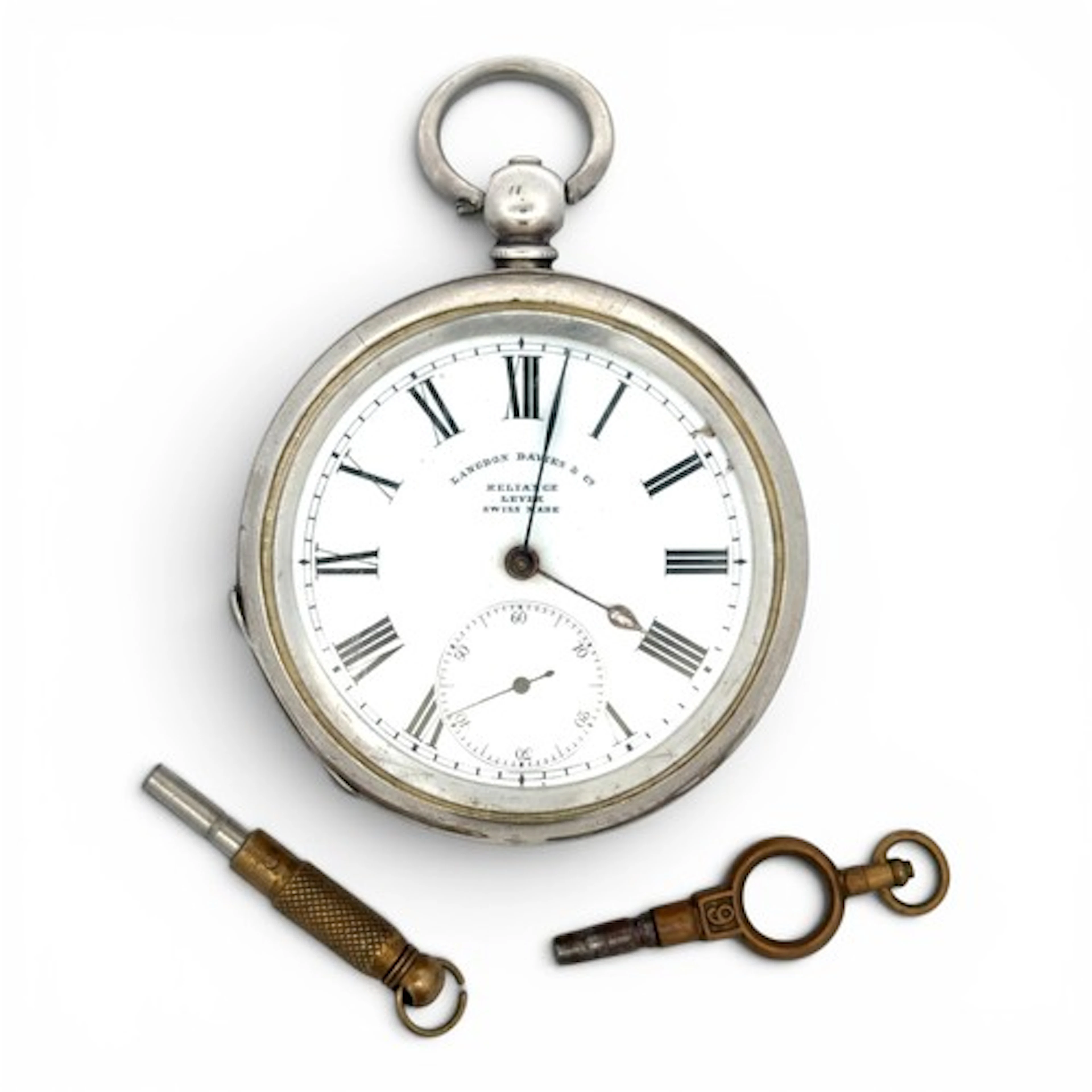 A 935 silver key wind pocket watch, the white enamel dial in...