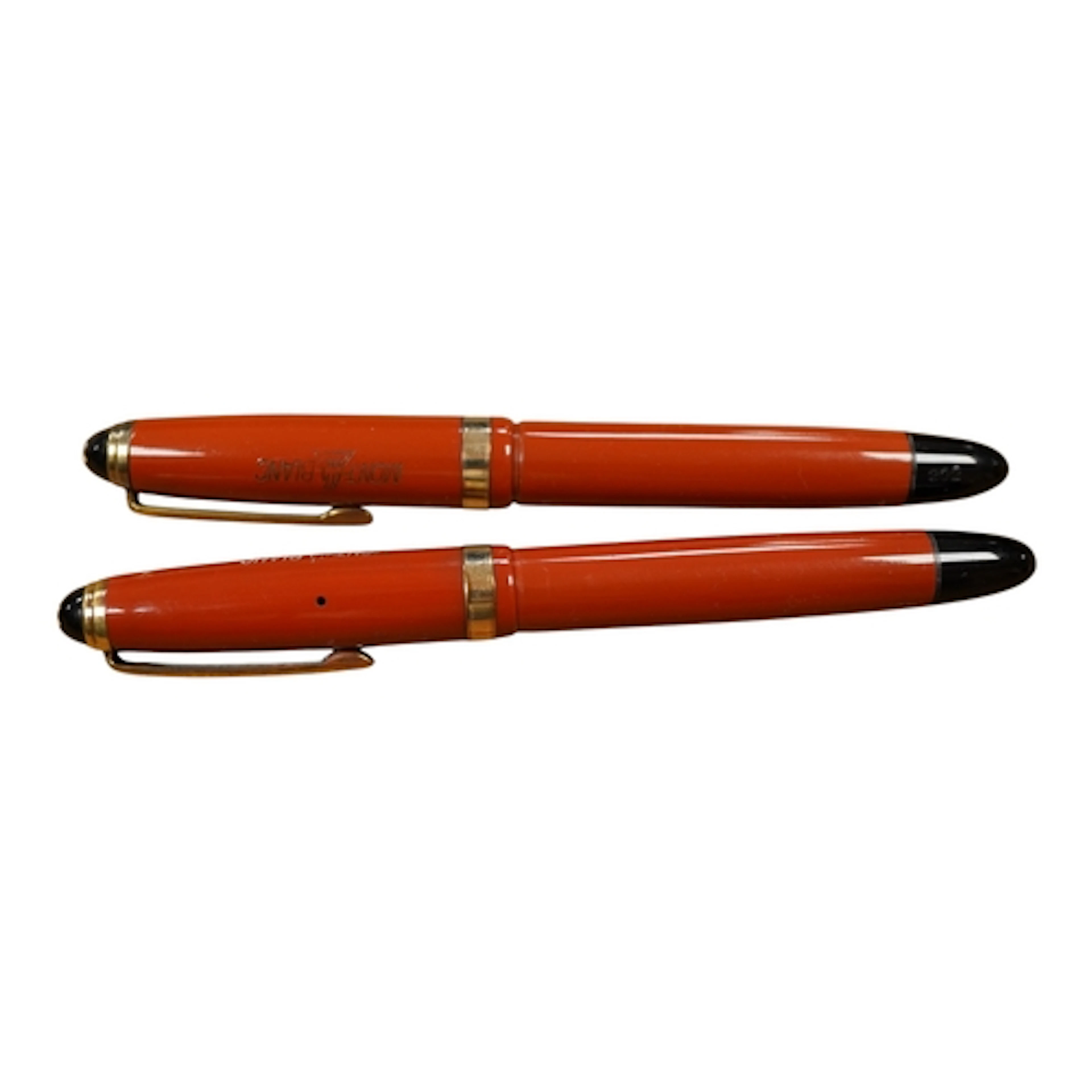 A pair of red vintage Montblancs in near mint condition, fit...