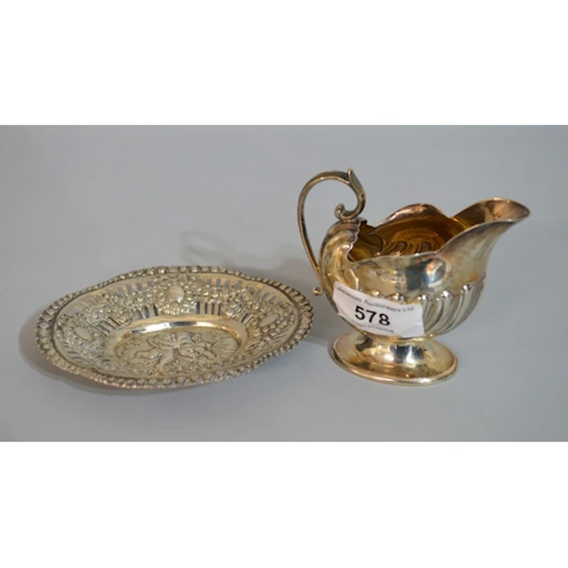Small Sheffield silver cream jug, 2.4oz t, together with a C...