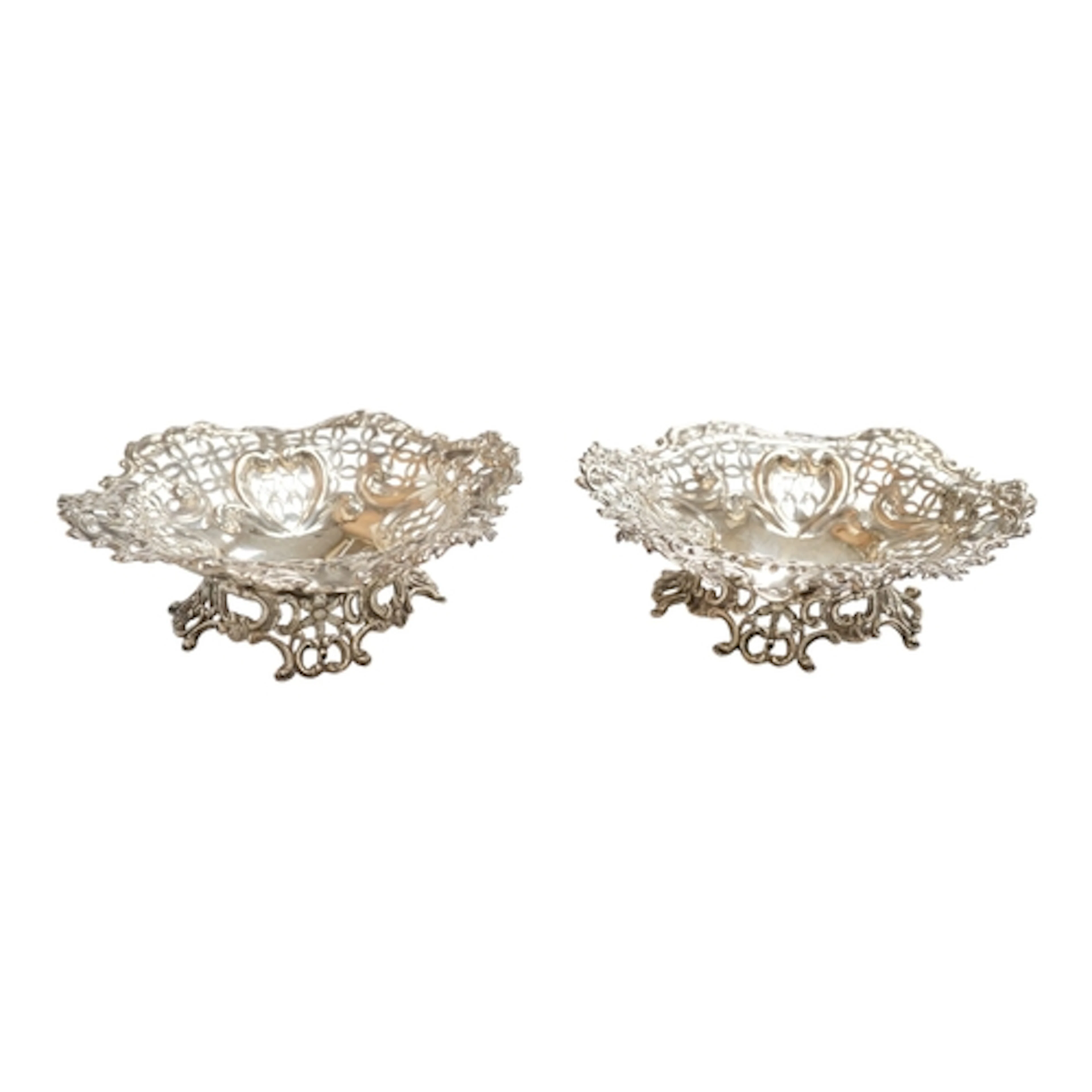 A pair of late Victorian pierced silver bonbon dishes by Gol...