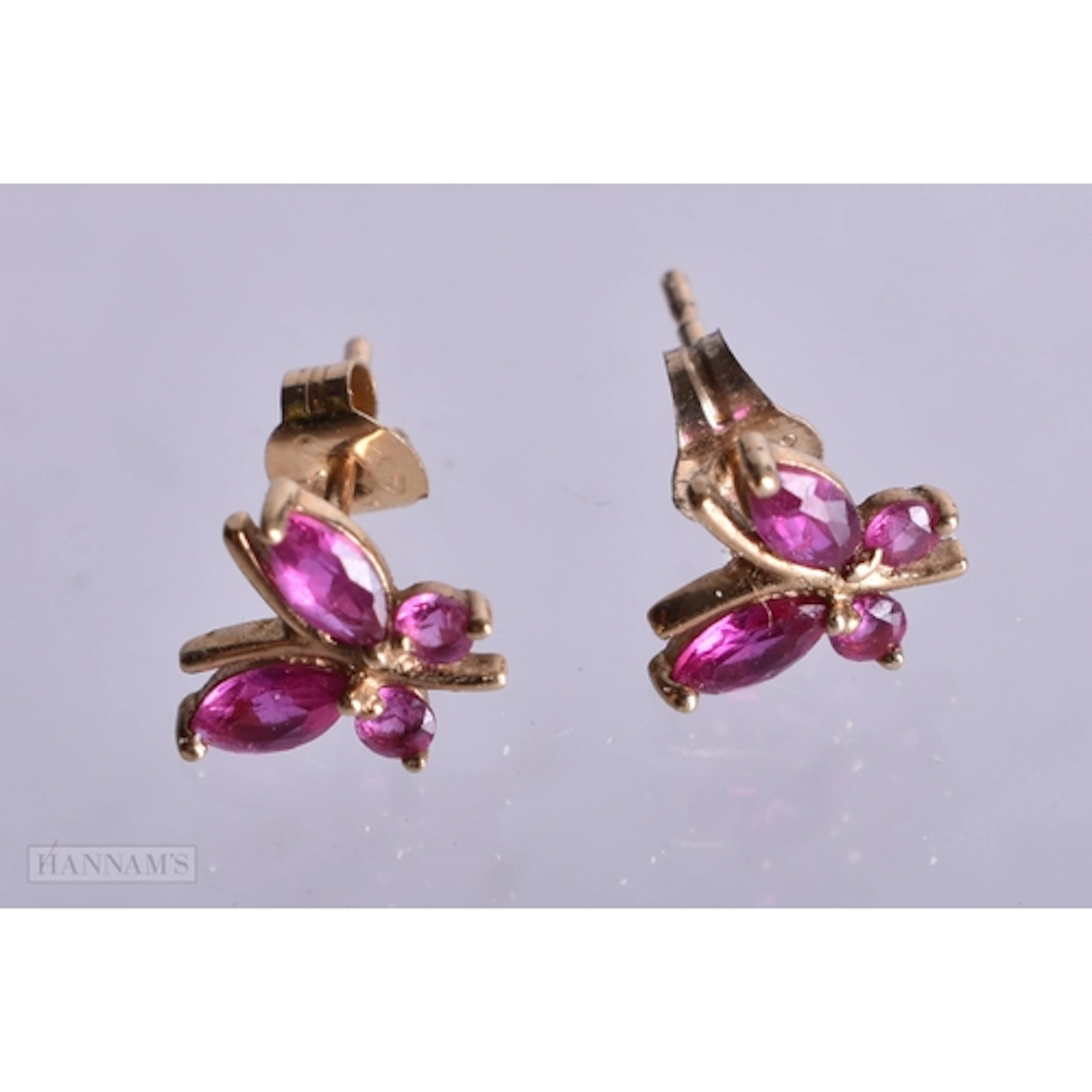 9ct gold synthetic ruby butterfly stud earrings (0.5g). 0.75...