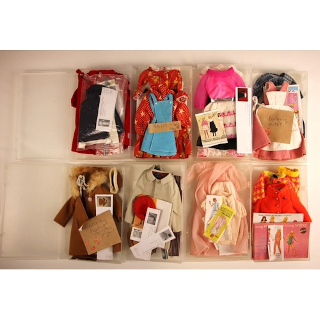 A quantity of unpackaged Barbie clothing items and fashion o...