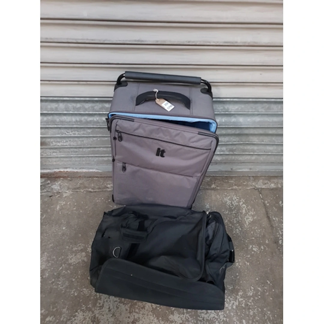 TWO SUITCASES including IT Note: cases and bags are empty