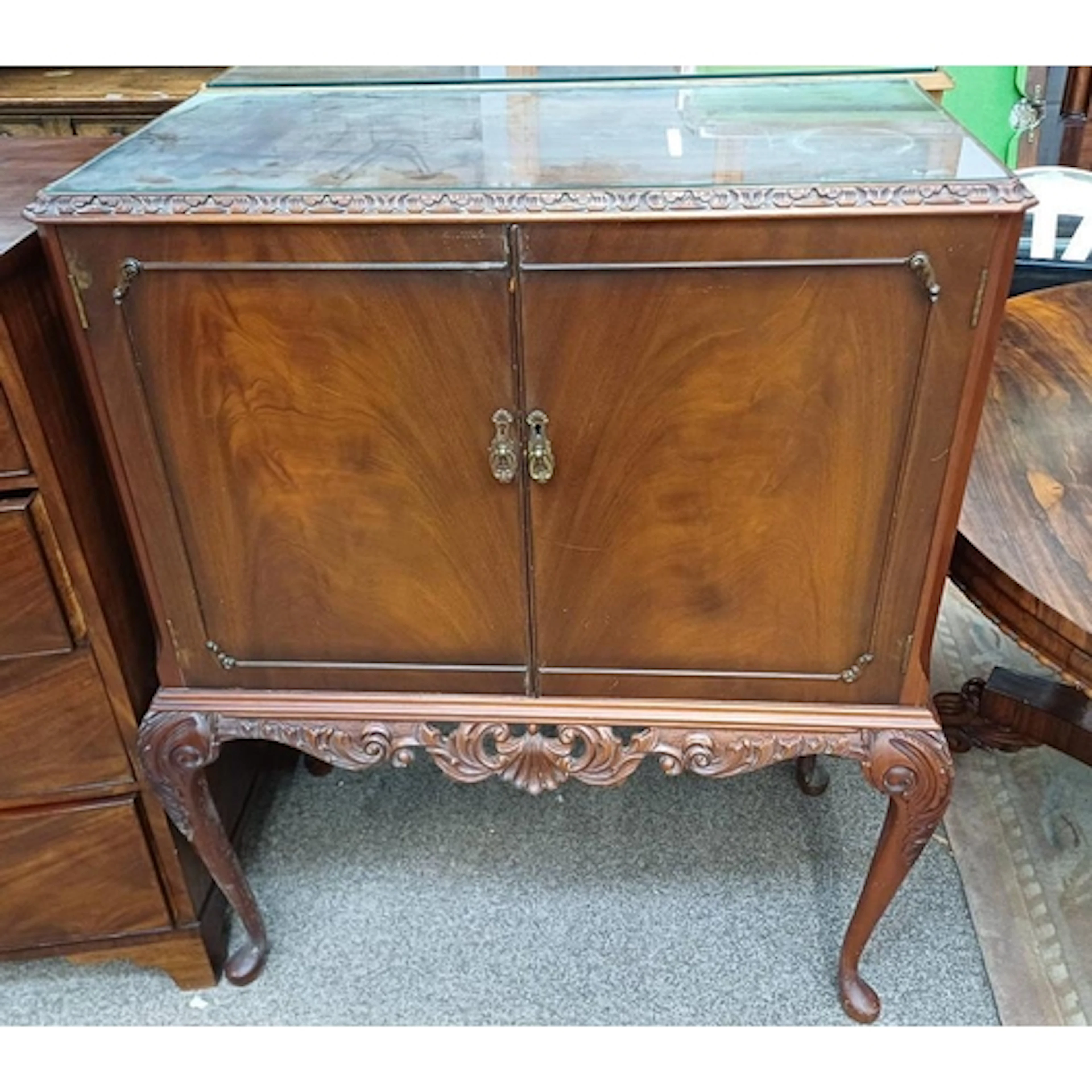 20TH CENTURY MAHOGANY COCKTAIL CABINET WITH 2 PANEL DOORS OP...