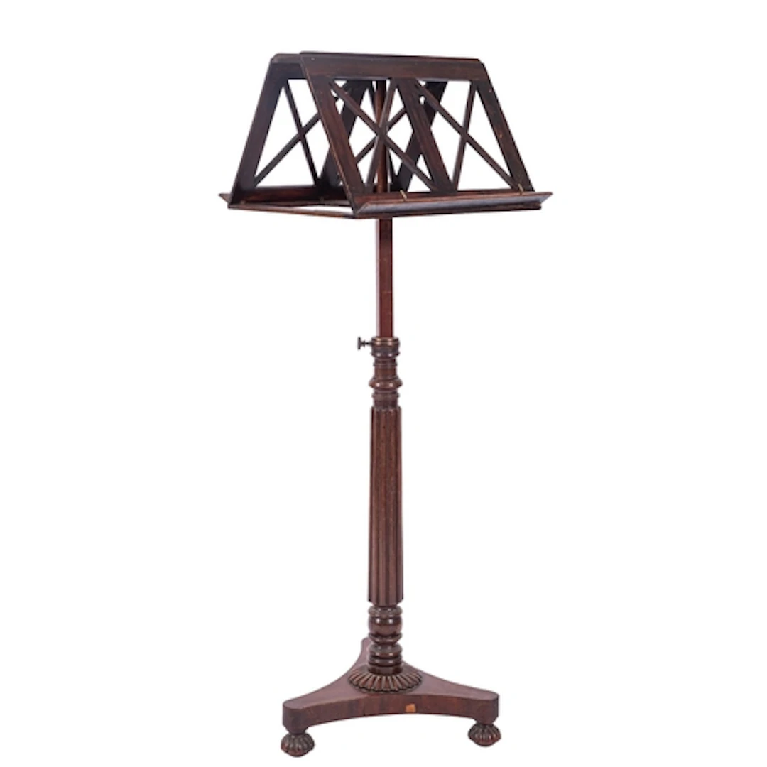 A Regency mahogany duet stand, circa 1815; the opposing open...