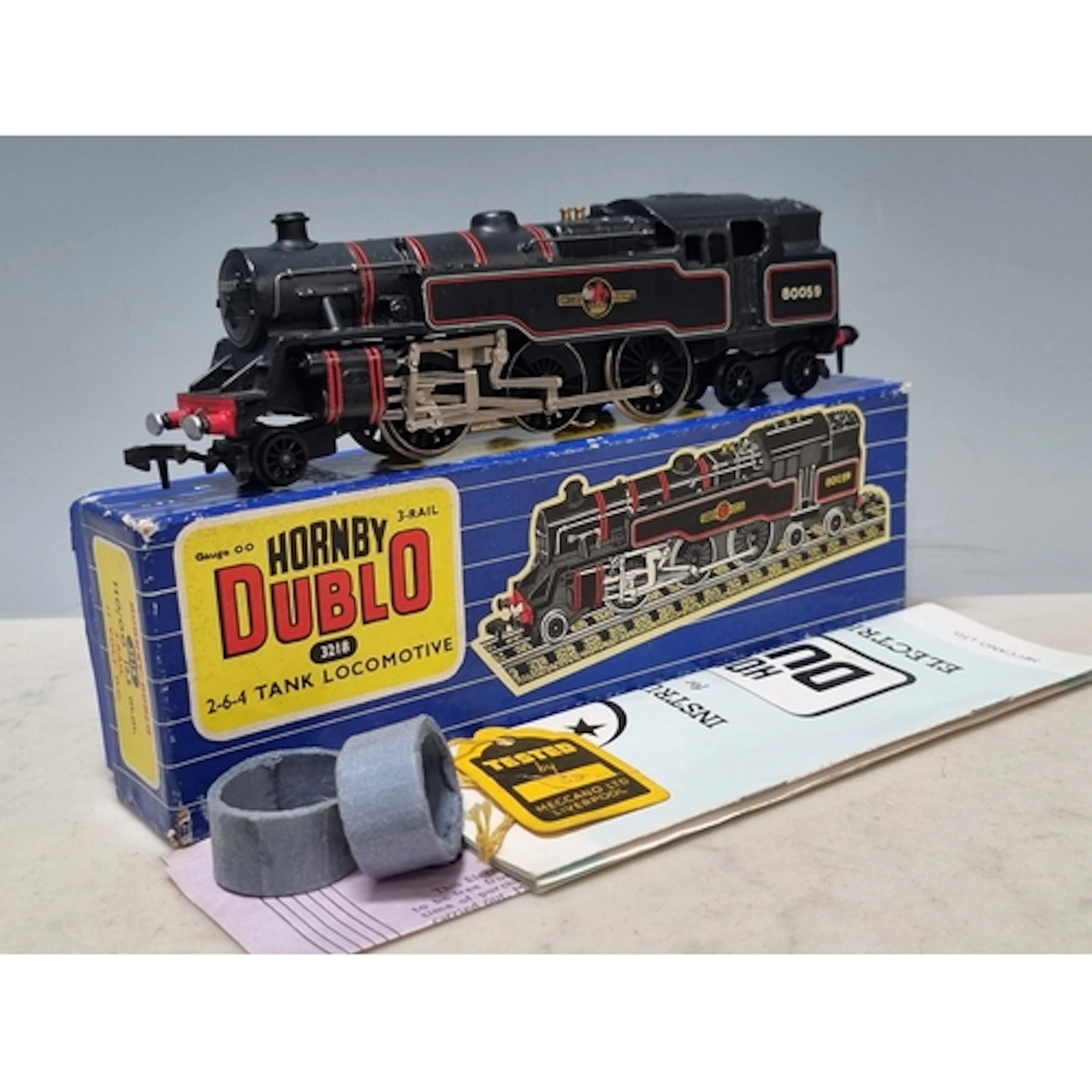 A boxed Hornby Dublo 3218 2-6-4T No.80059, rarer late issue ...
