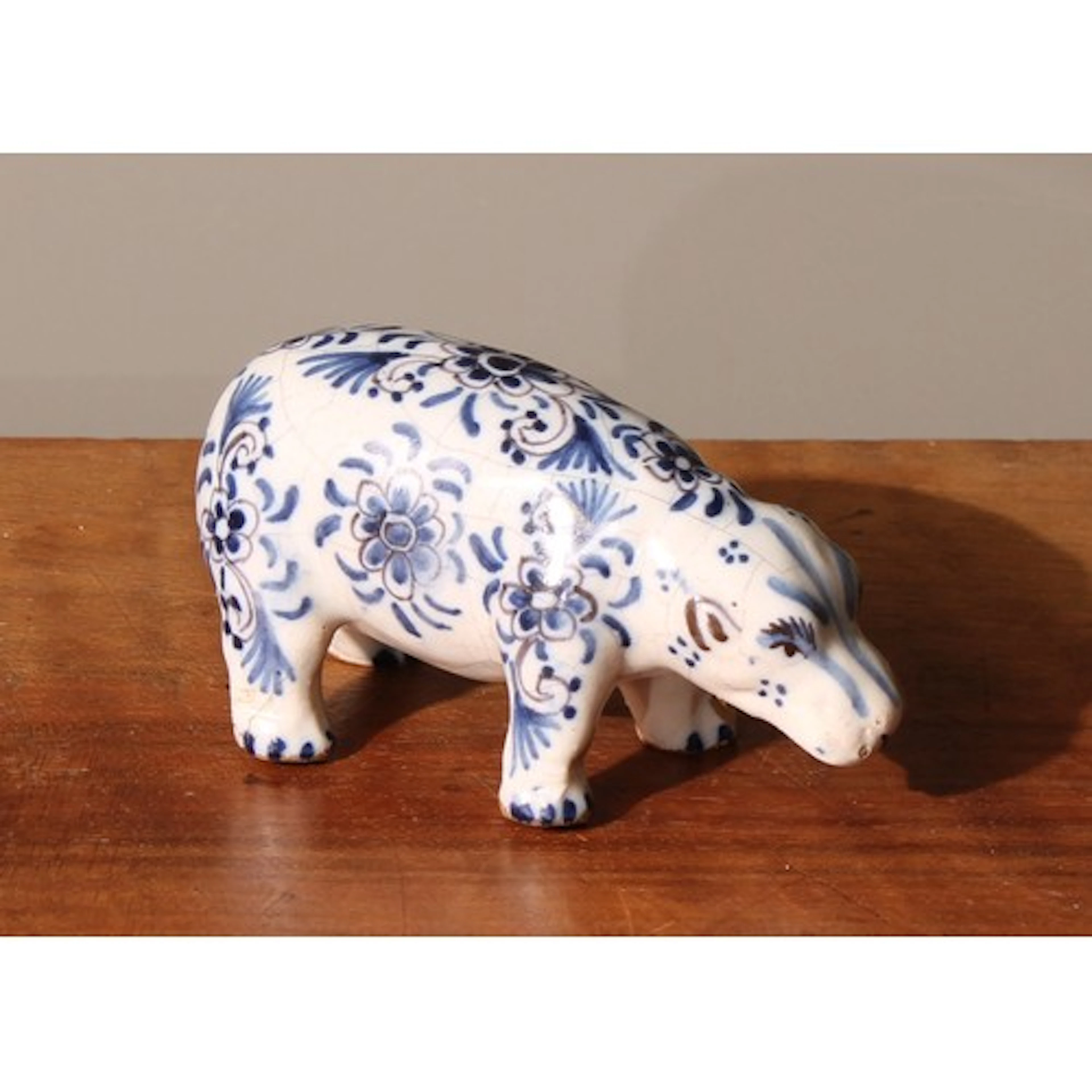 A 19th century Delft ware cabinet figure, of a hippopotamus,...