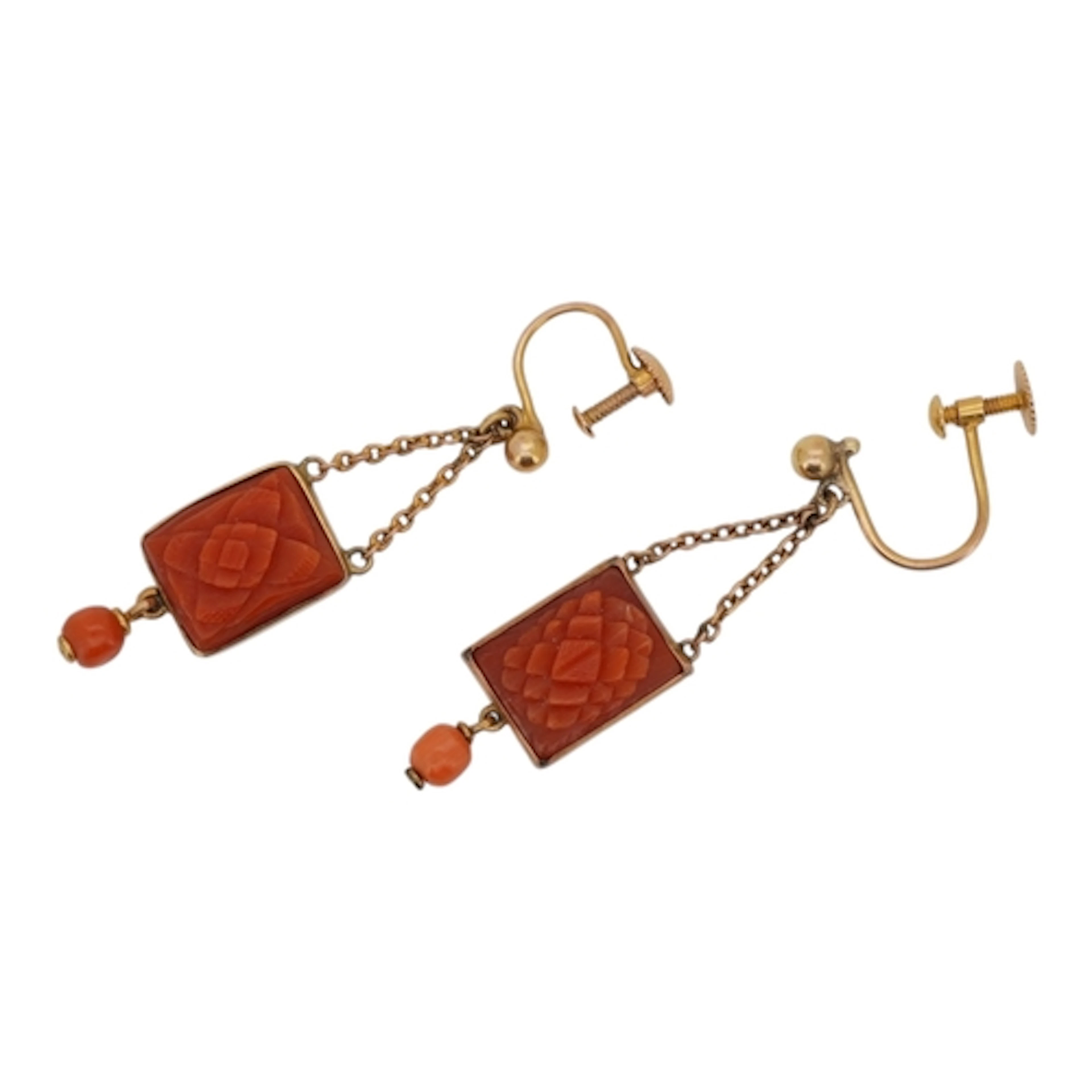 A pair of 9ct and carved coral panel and coral bead set drop...