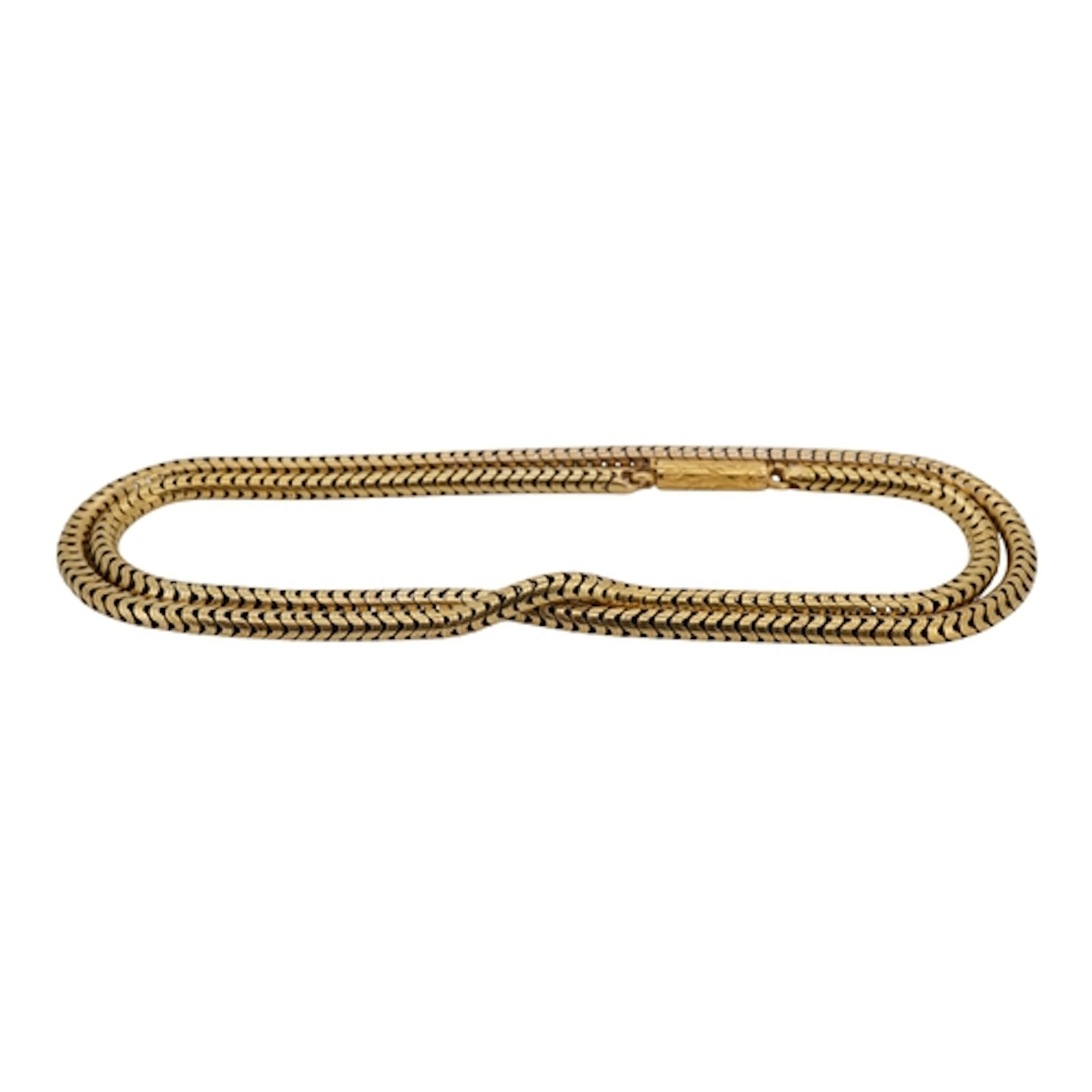 An unmarked yellow metal snake link chain, with engrave barr...