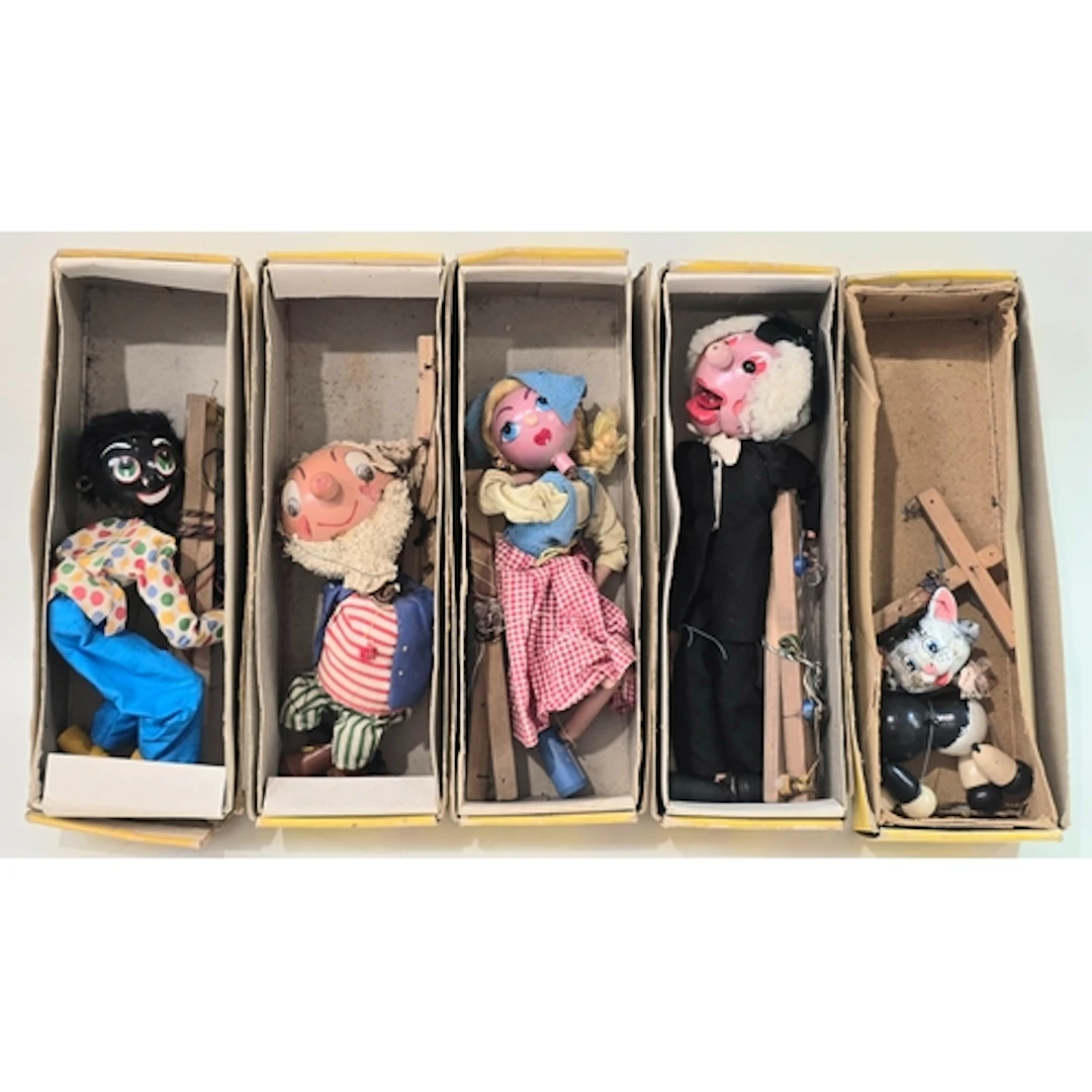 A collection of five vintage boxed Pelhams Puppets.