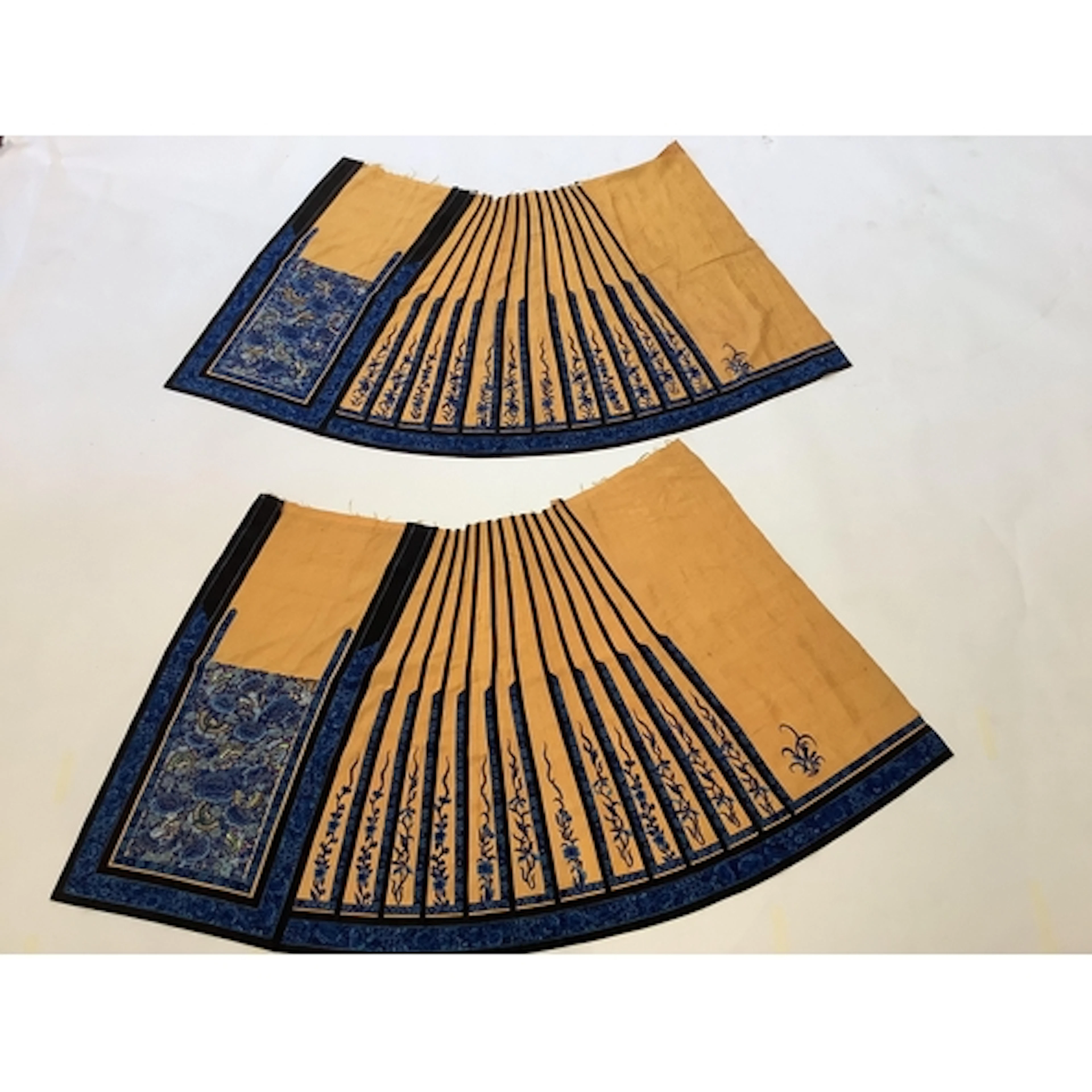 A matching pair of Chinese silk wedding skirts, blue embroid...