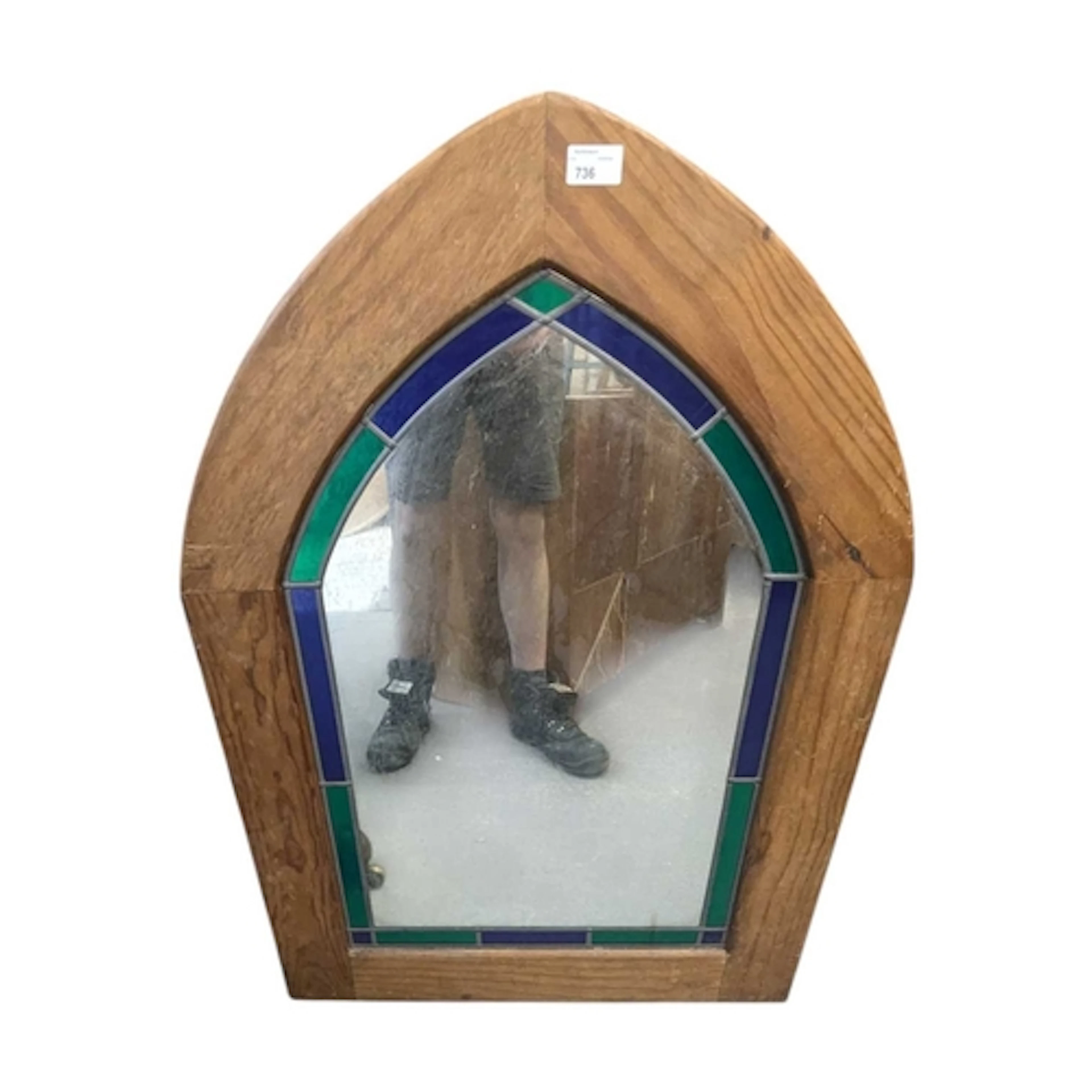 A 20th century Arts and Crafts style wall mirror. The frame ...