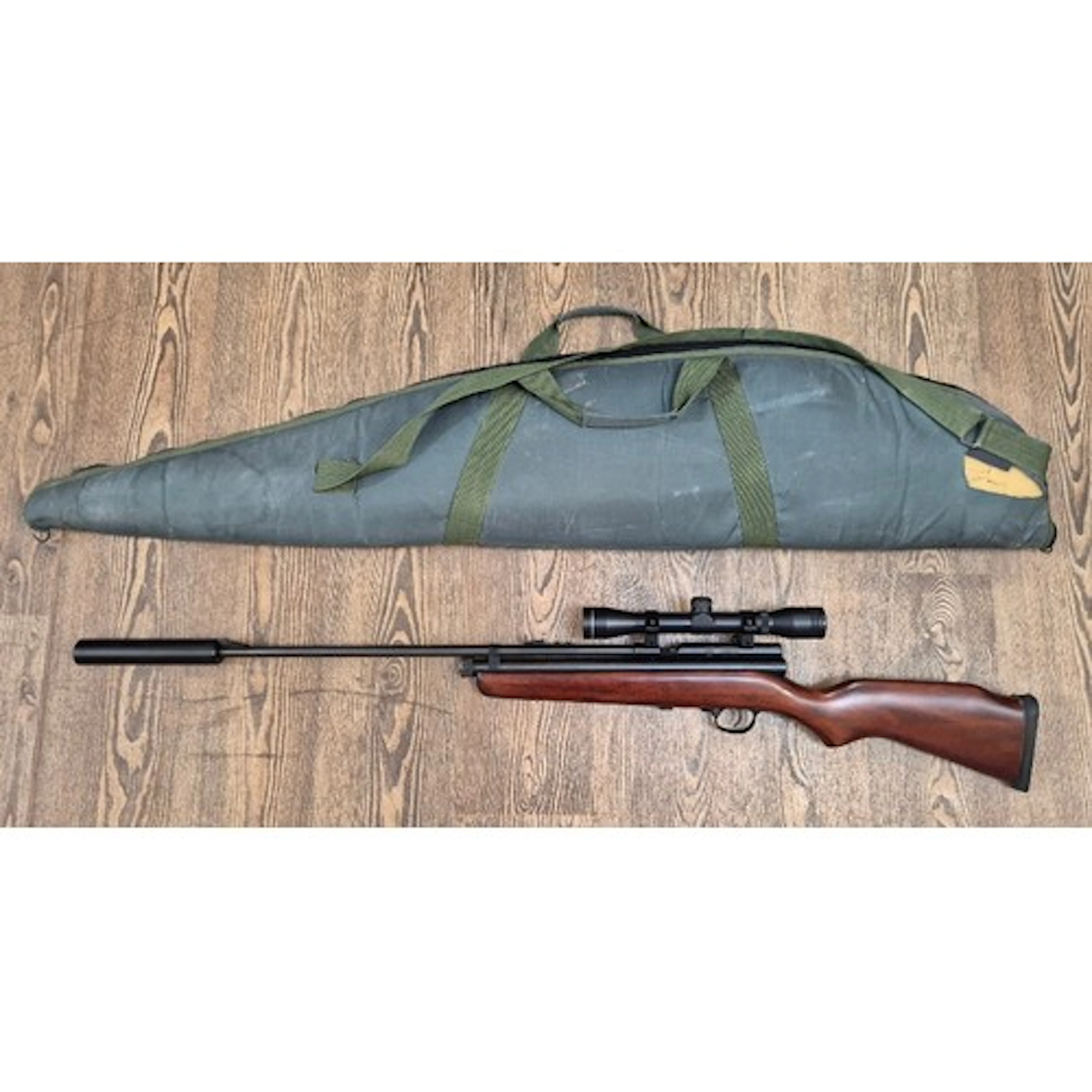 An SMK XS78CO2 .22 air rifle, with sound moderator, SMK 4x32...