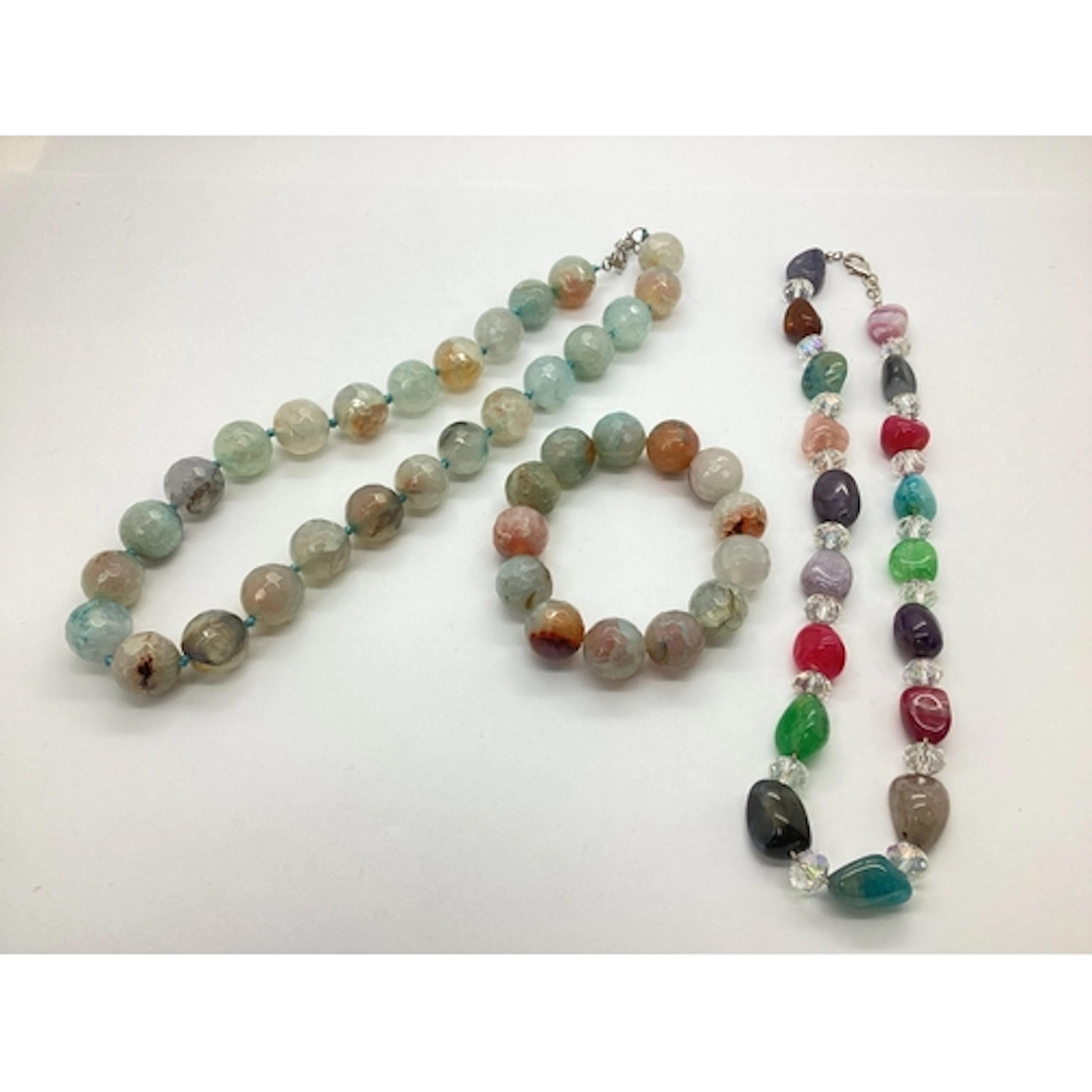 A Modern Polished Hardstone Faceted Bead Necklace, of unifor...