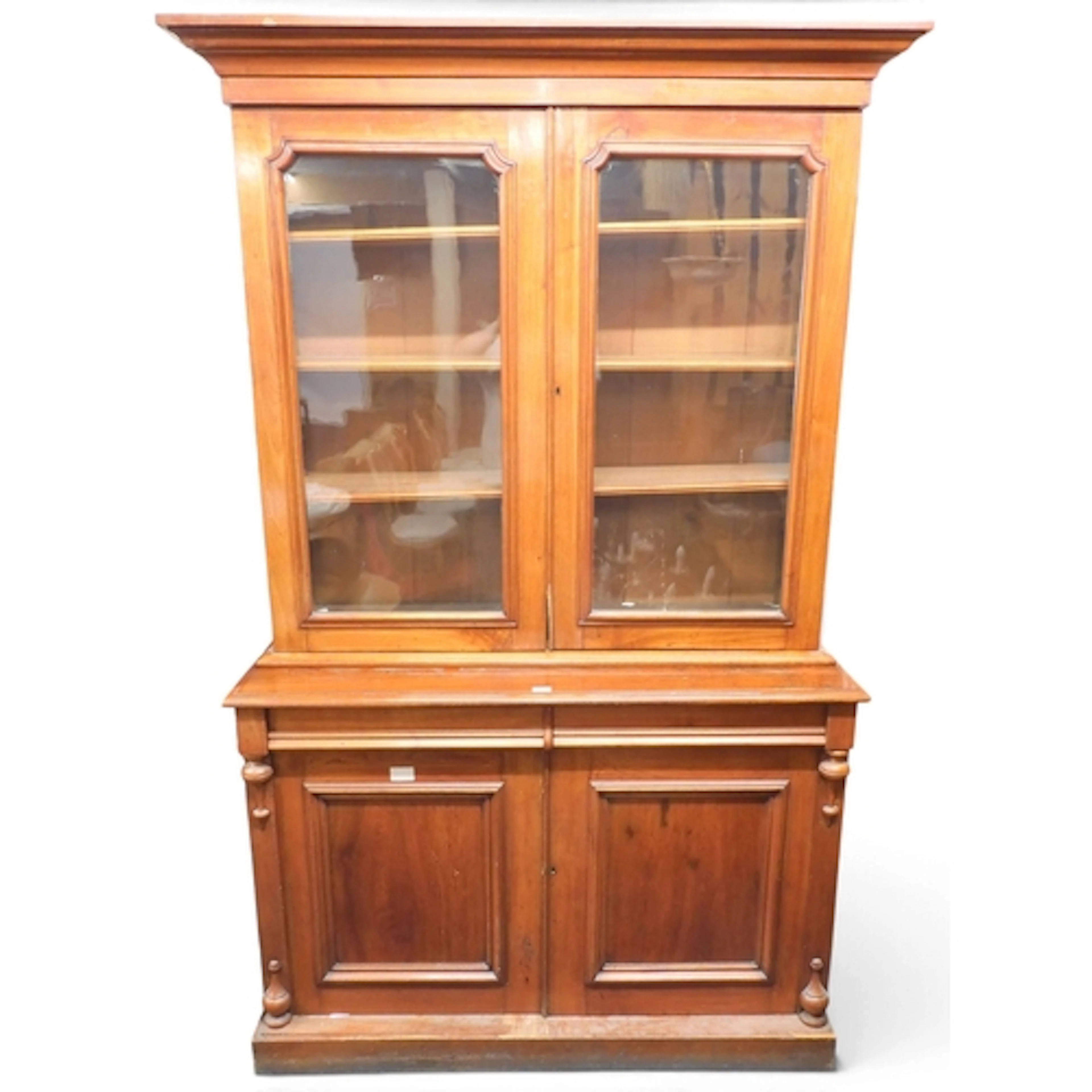 A Victorian mahogany library bookcase with moulded cornice o...