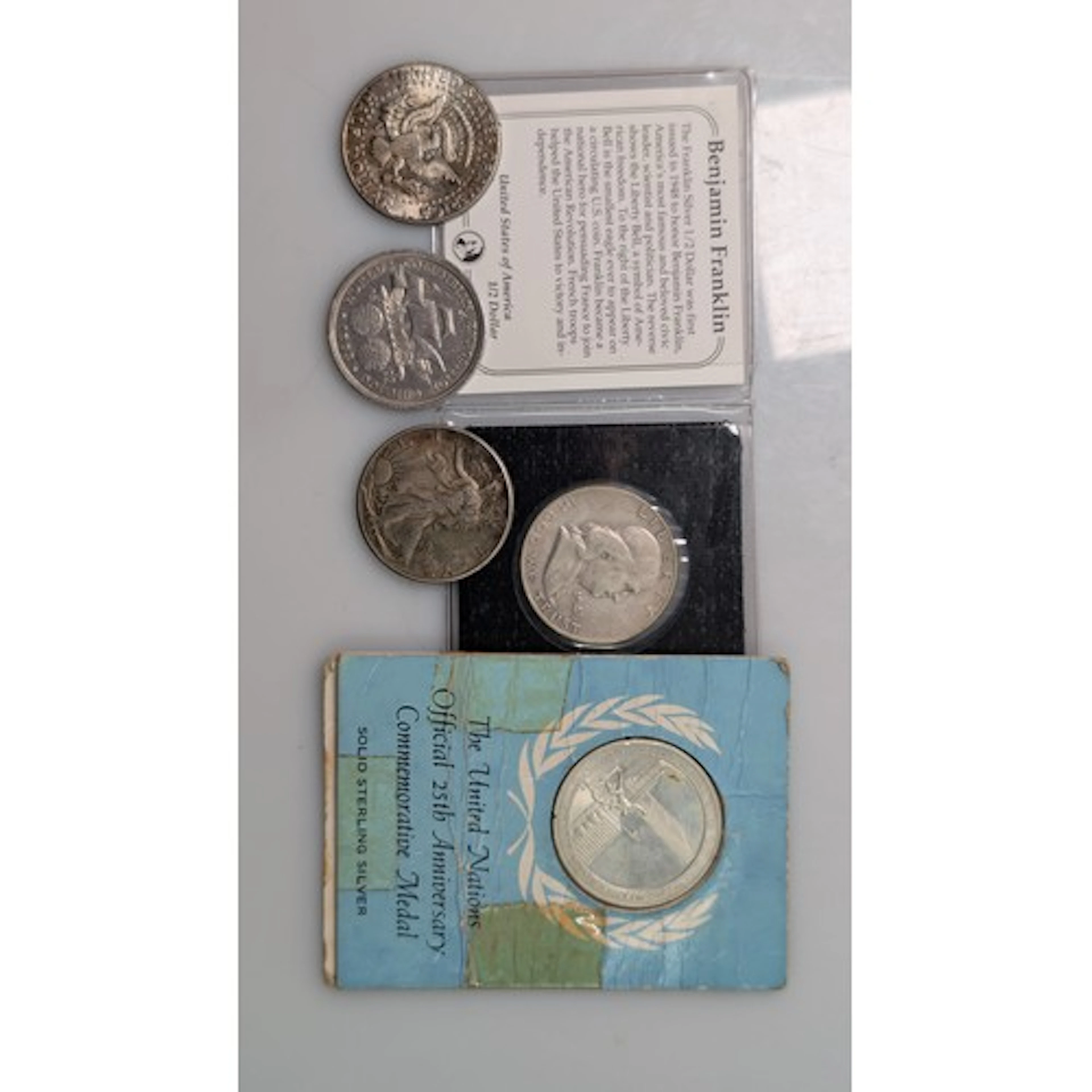 Five USA silver coins, comprising: 1893 Columbia Exposition ...
