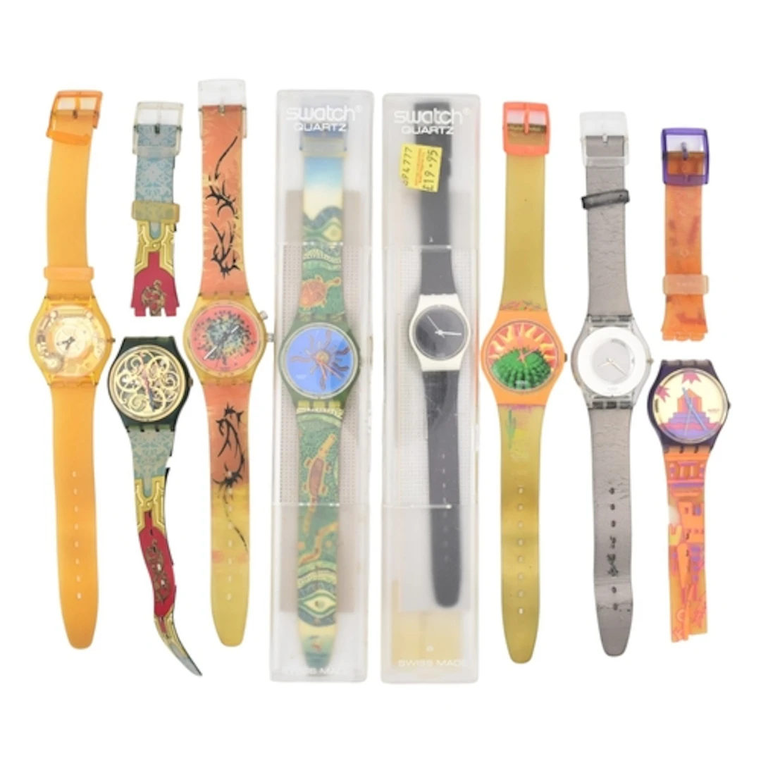 A collection of eight various Swatch watches. Eight watches ...