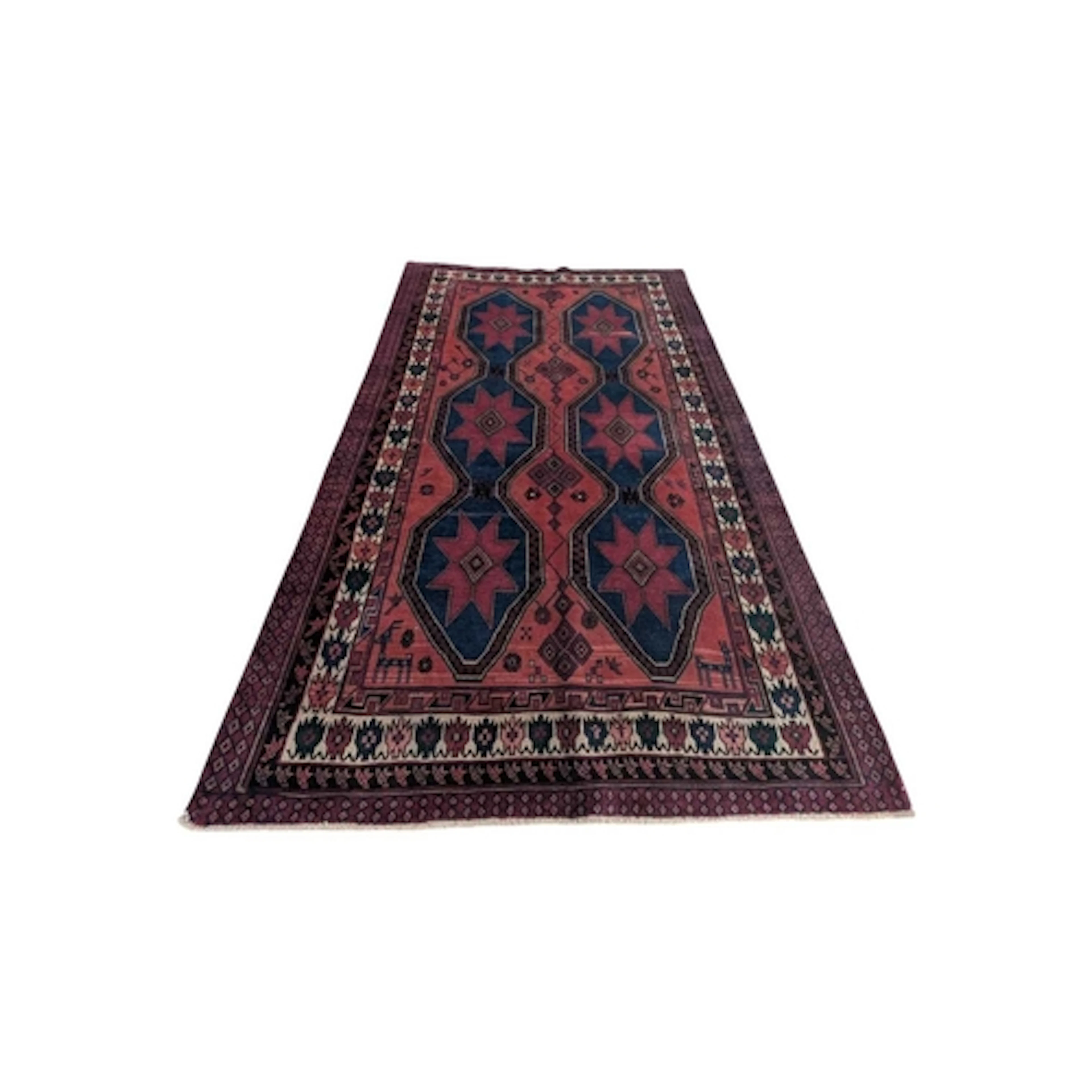 A vintage South West Persian Shiraz carpet floor rug. In red...