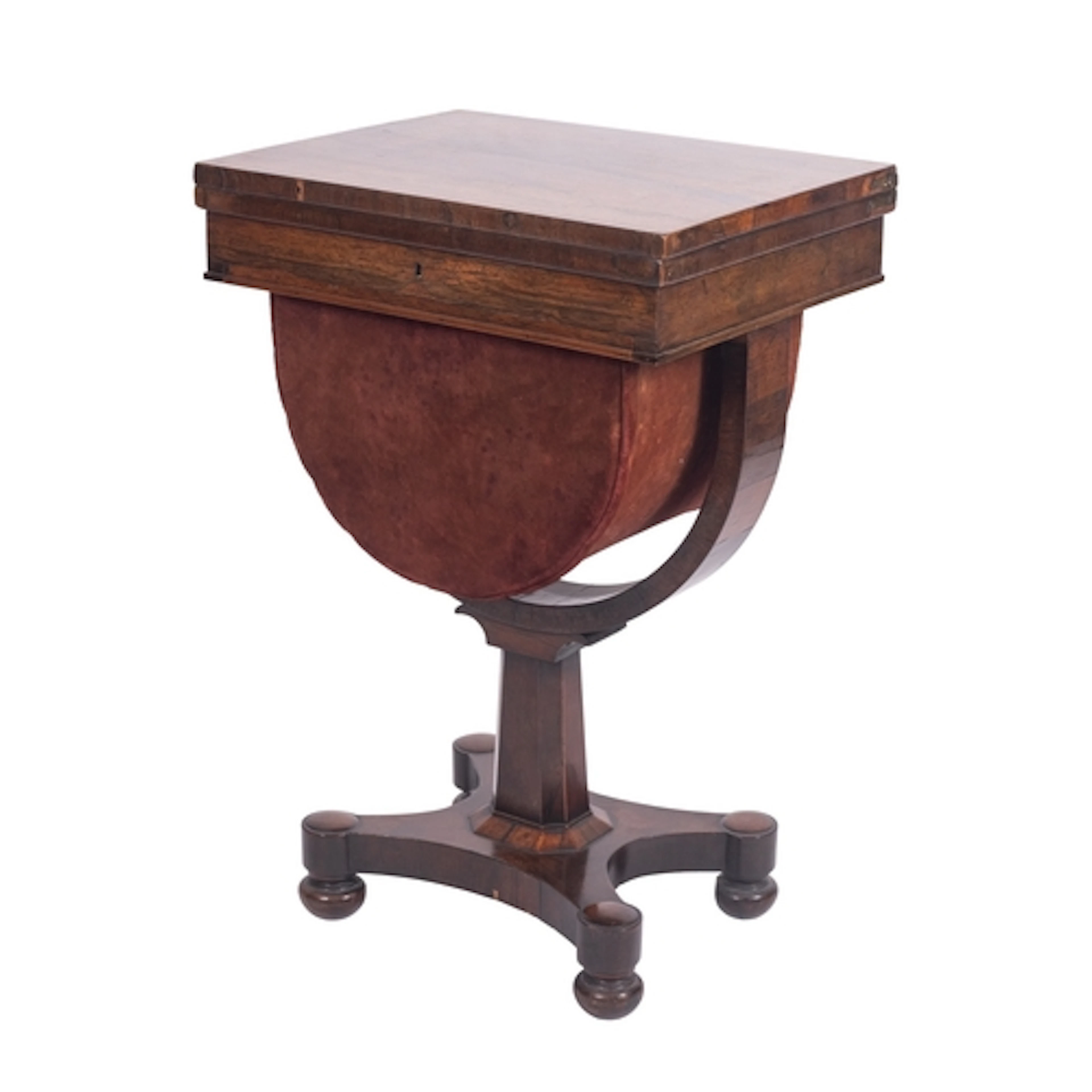 A George IV rosewood work and games table, circa 1825; the h...