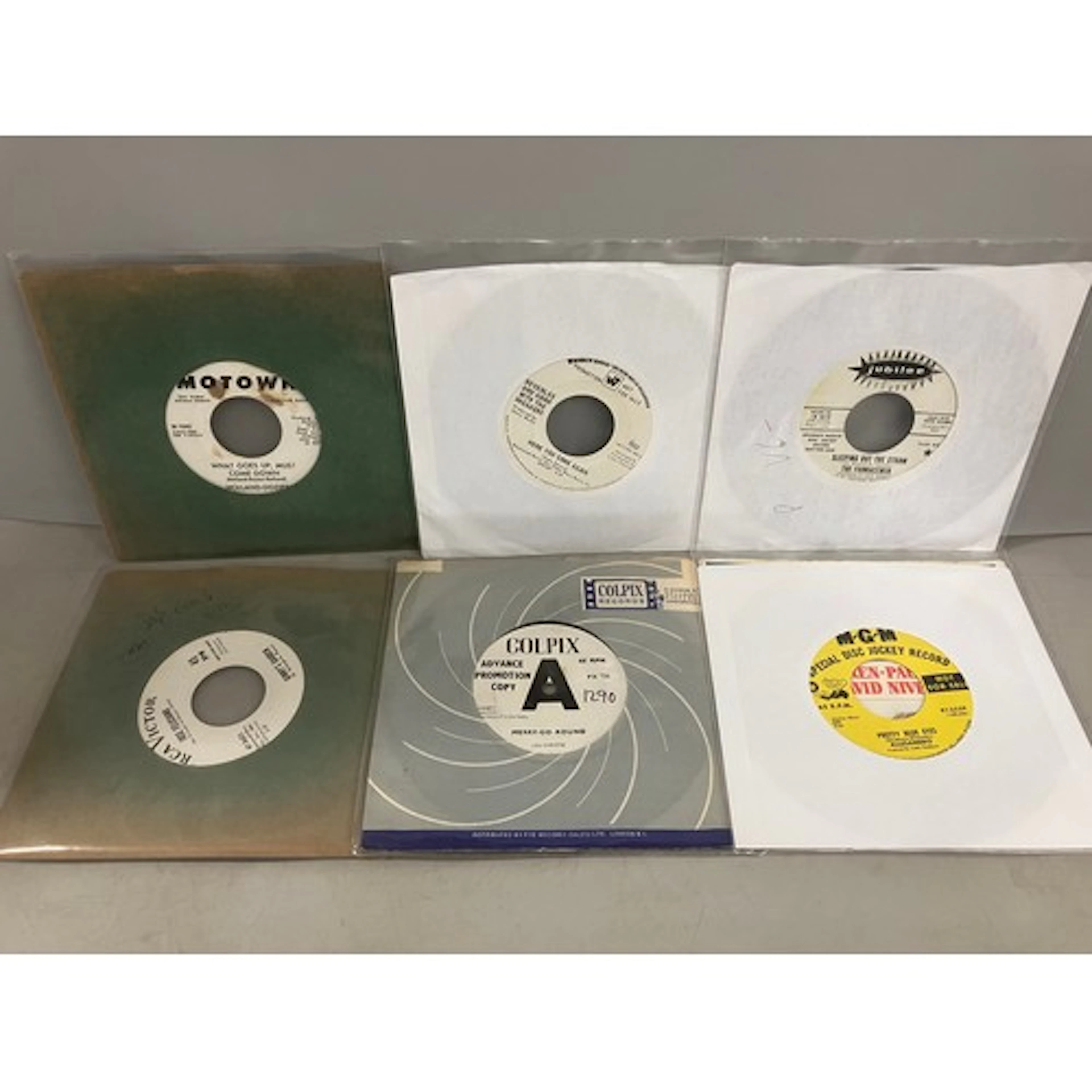 Twenty promotional demo copy singles to include by Warner Br...