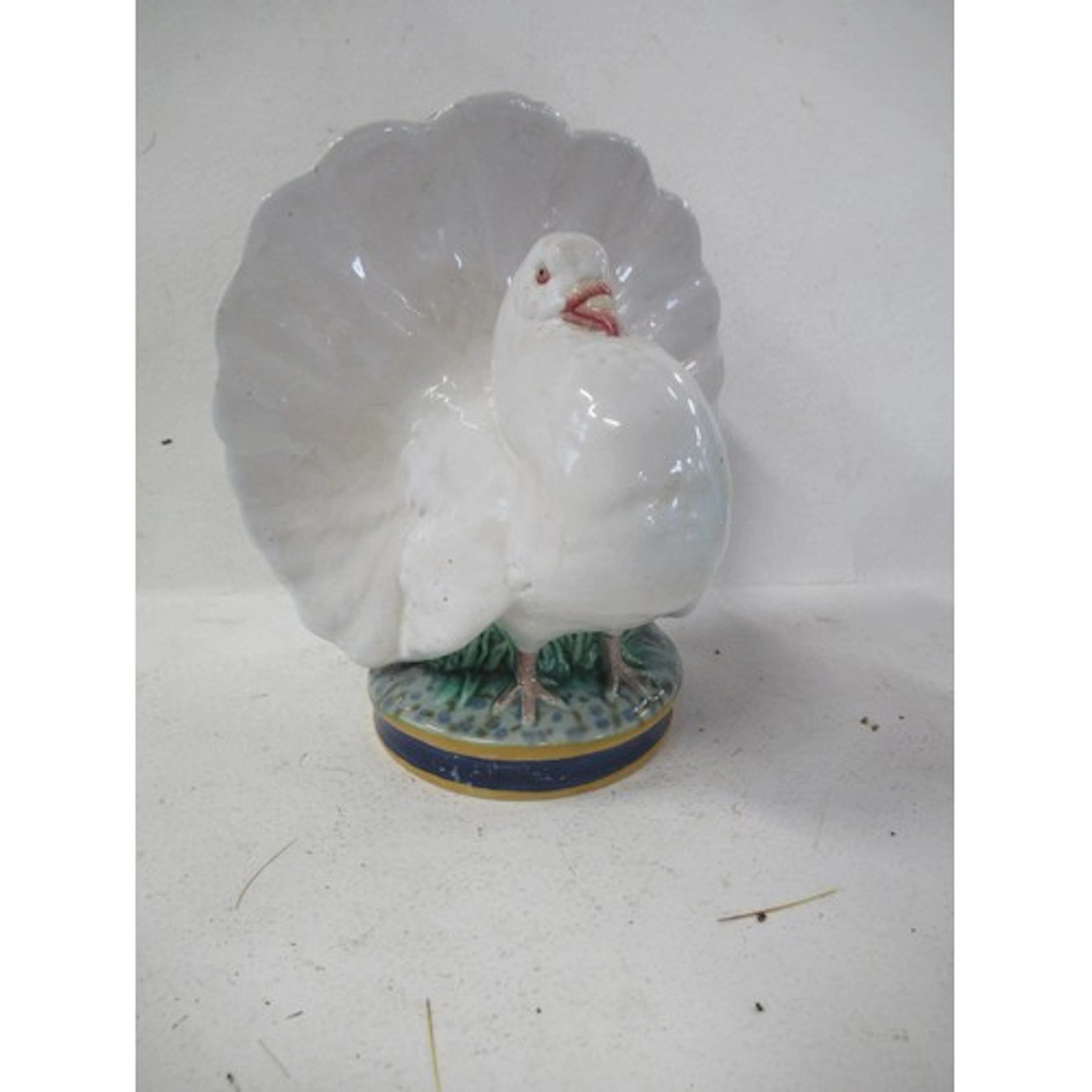 A 19th century English majolica flower holder, formed as a f...