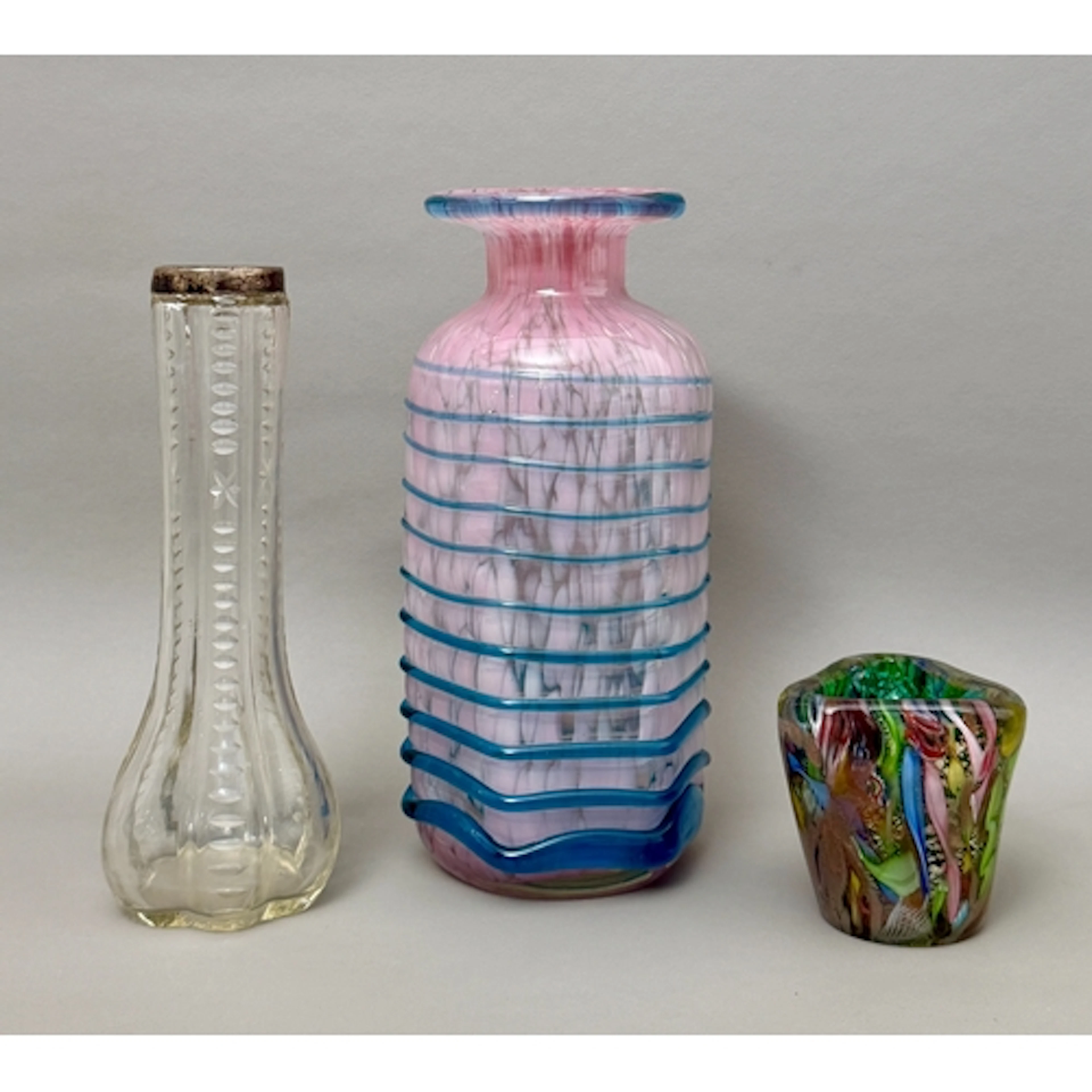 Three glass vases - a Mdina pink and blue trail vase, 20cm h...