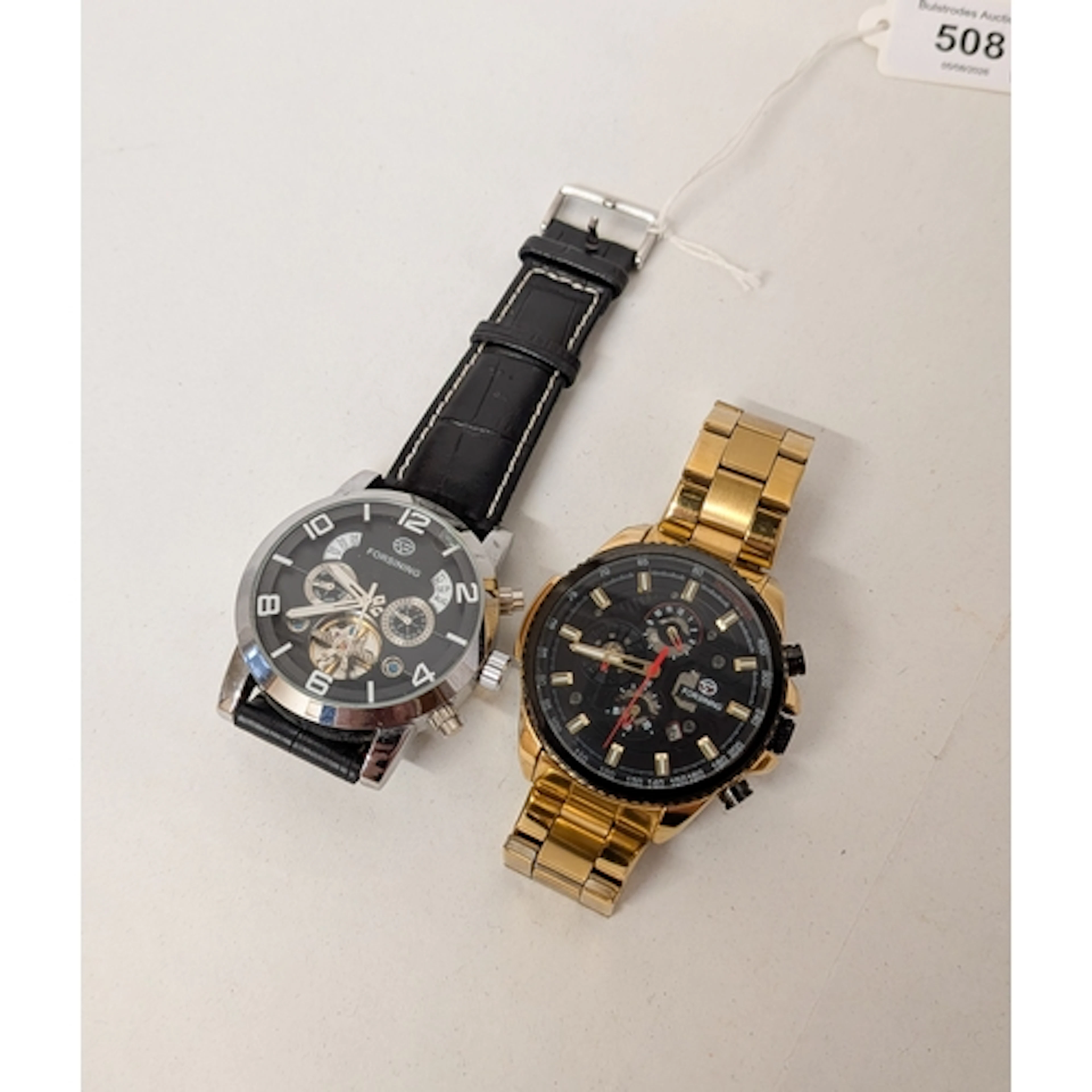 Two modern gent's Forsining automatic wrist watches, one on ...