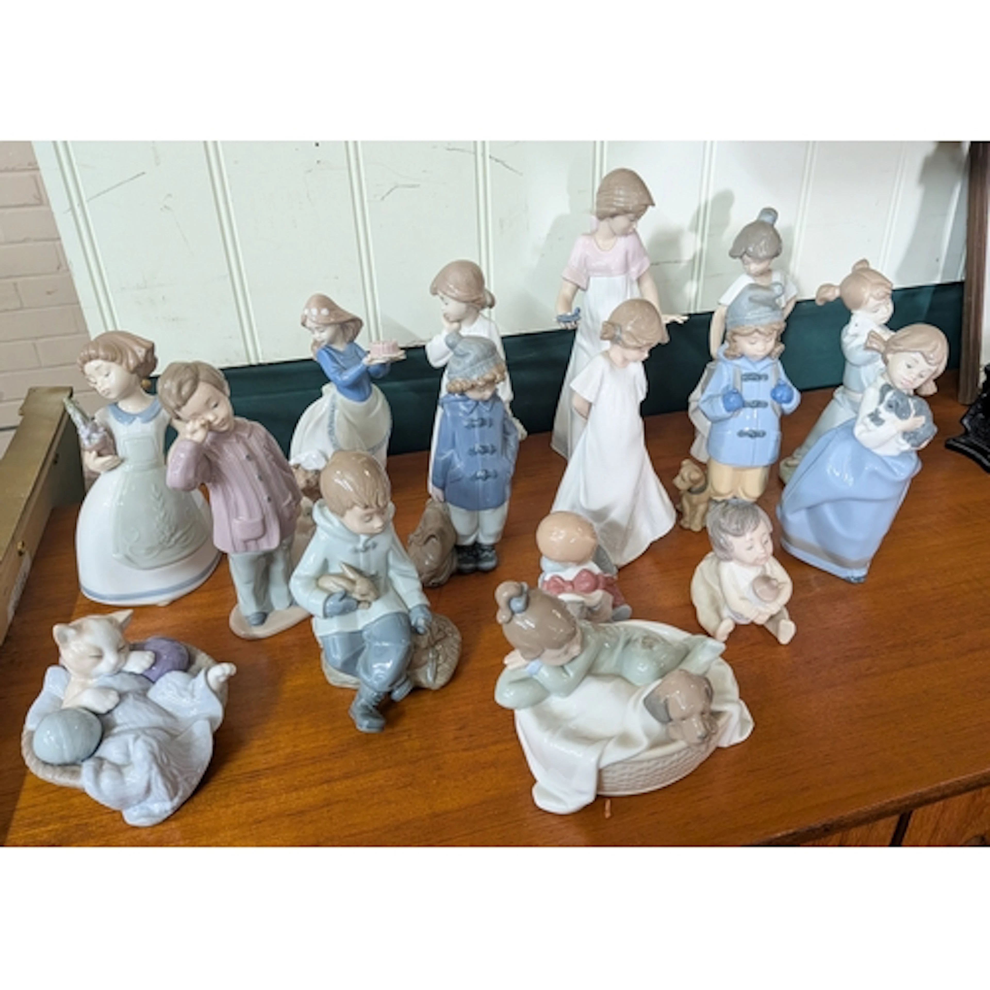 A collection of sixteen assorted Nao figure ornaments