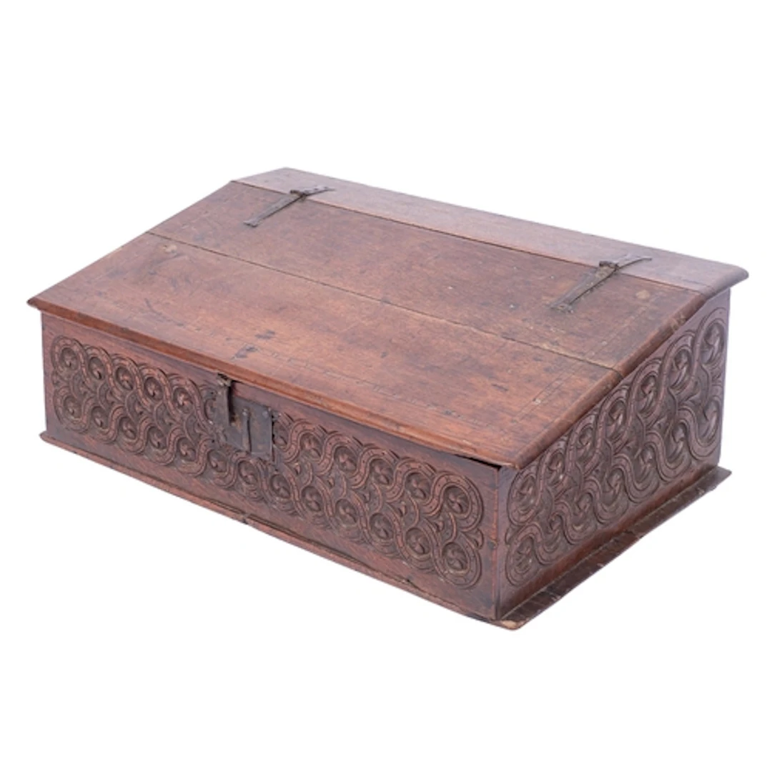 A Restoration oak Bible box, circa 1660; the hinged sloping ...