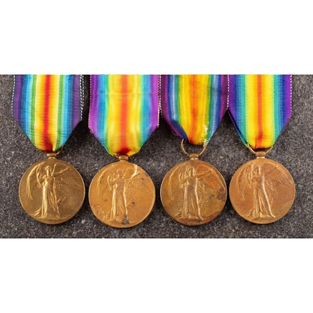 Four George V Victory Medals. 'TS-902 Pte A J Owen ASC' '32...