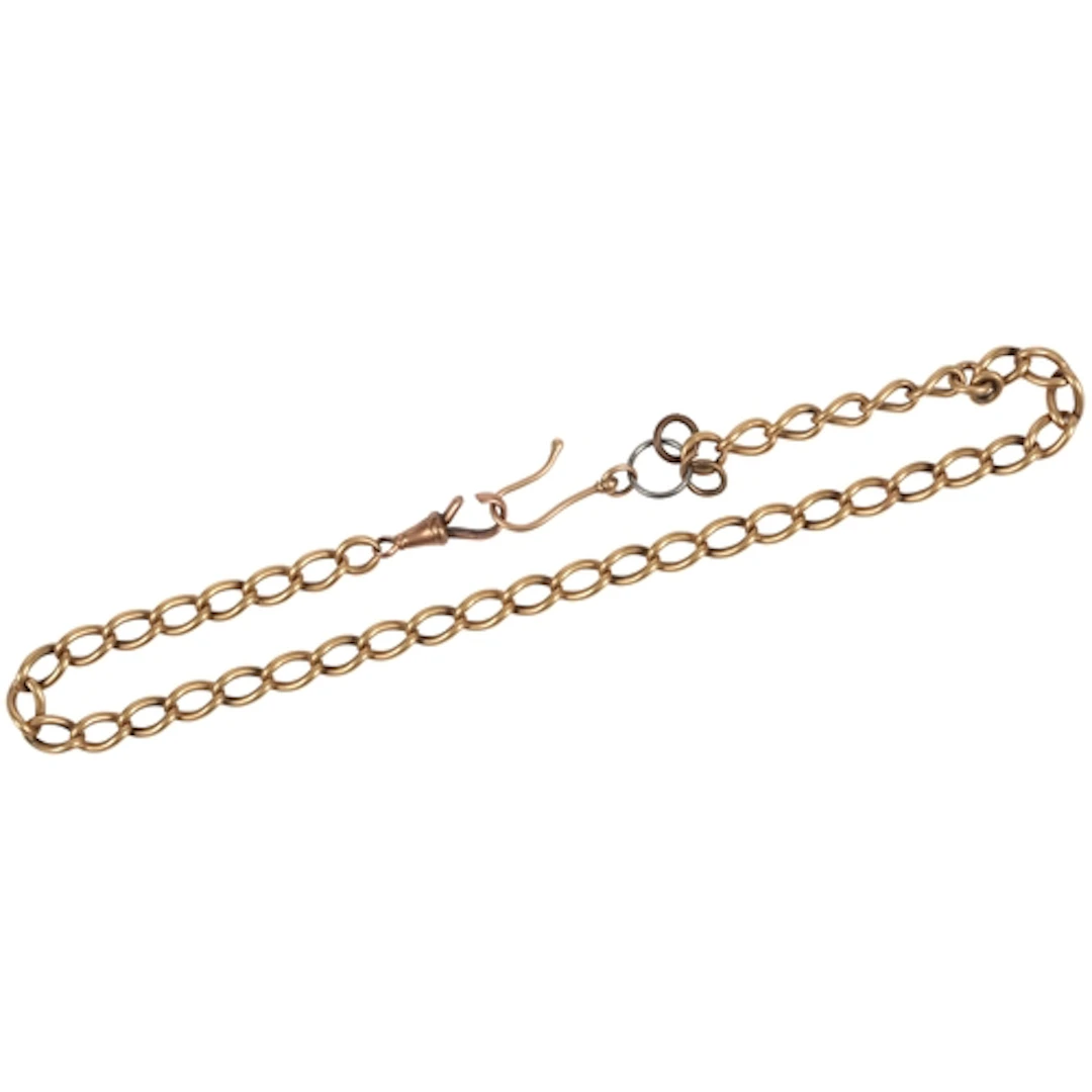 A gold watch chain, early 20th century, of curb linking in g...