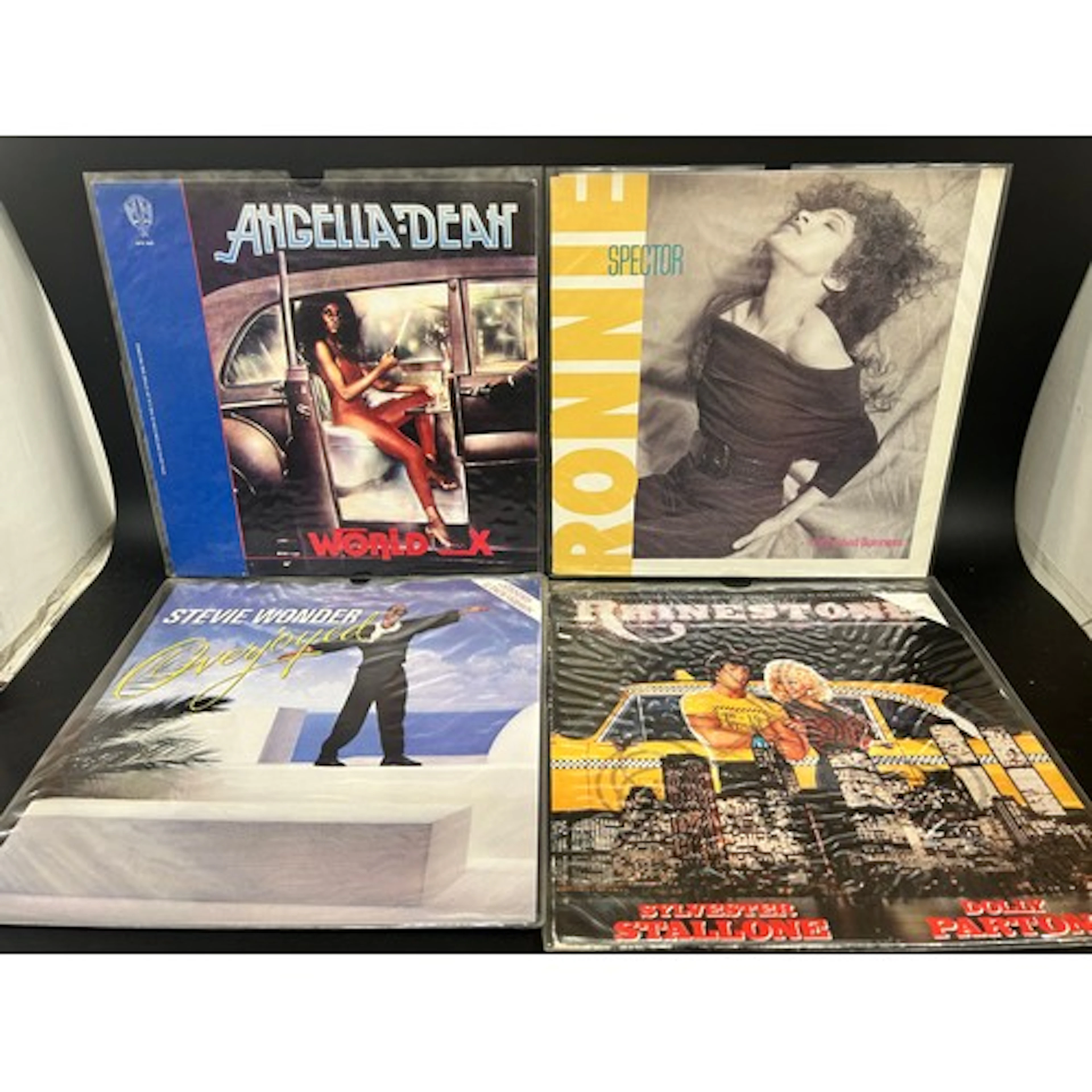 Thirty assorted vinyl LP records and some 12" singles to inc...