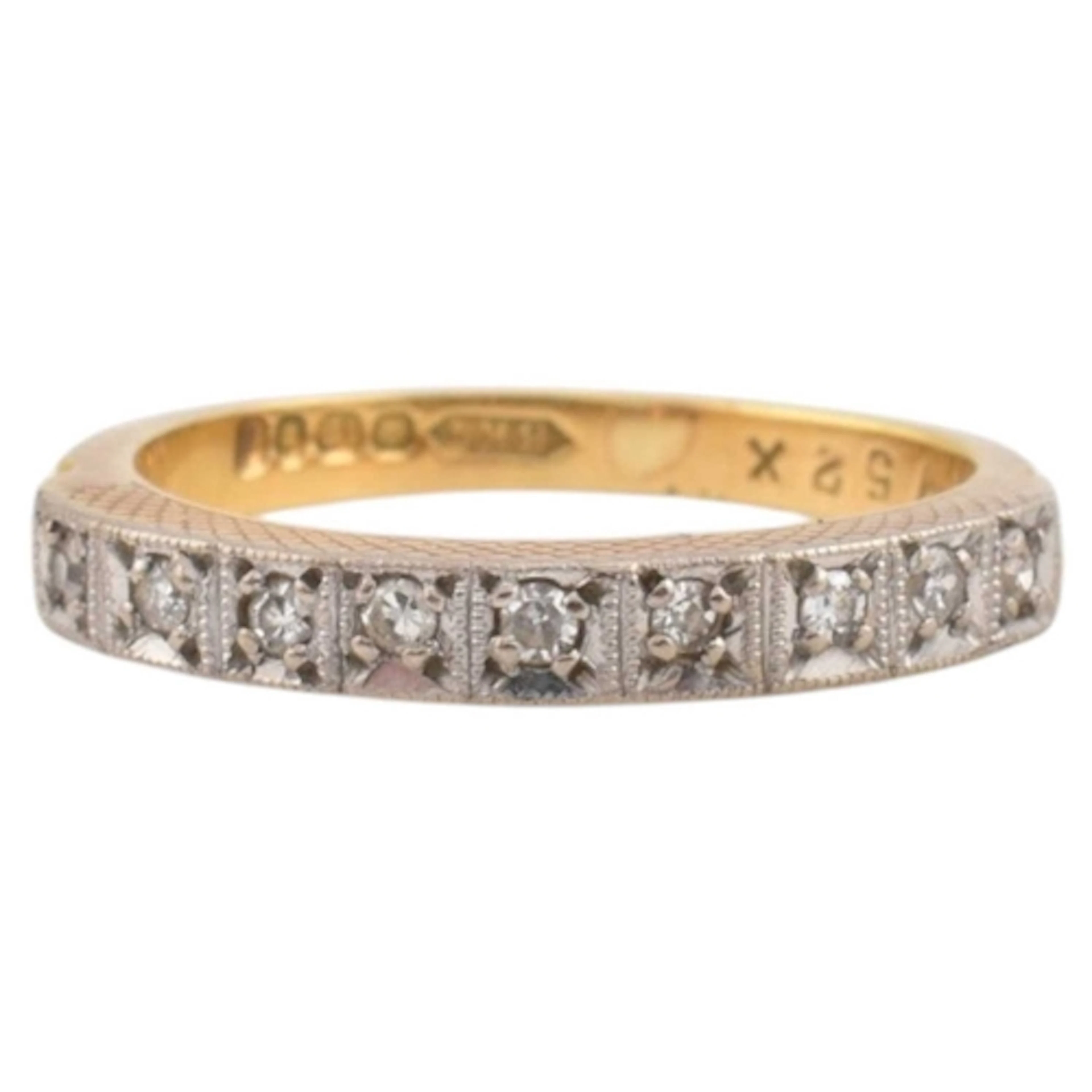A hallmarked 18ct gold and diamond half hoop ring. The ring ...