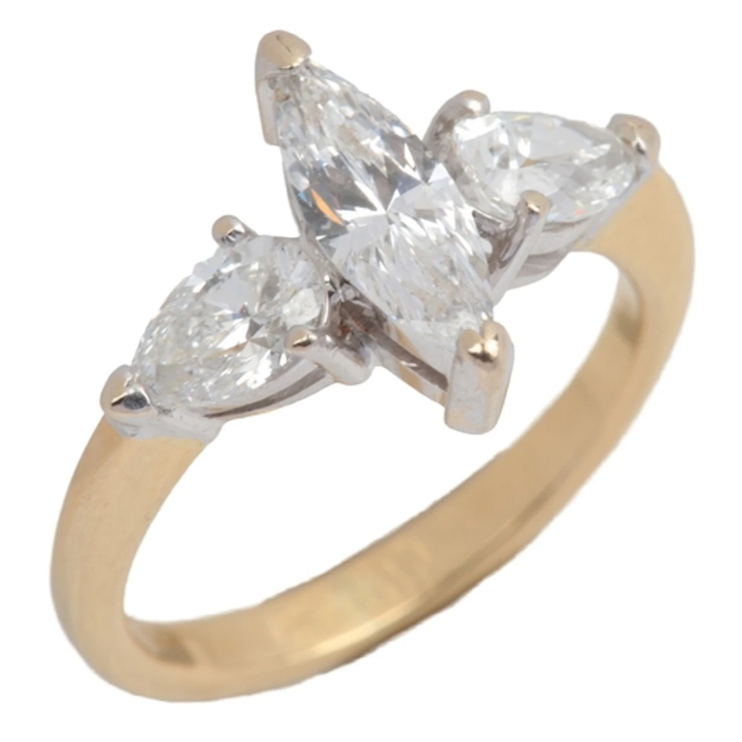 A diamond and synthetic diamond ring, set with a marquise-sh...