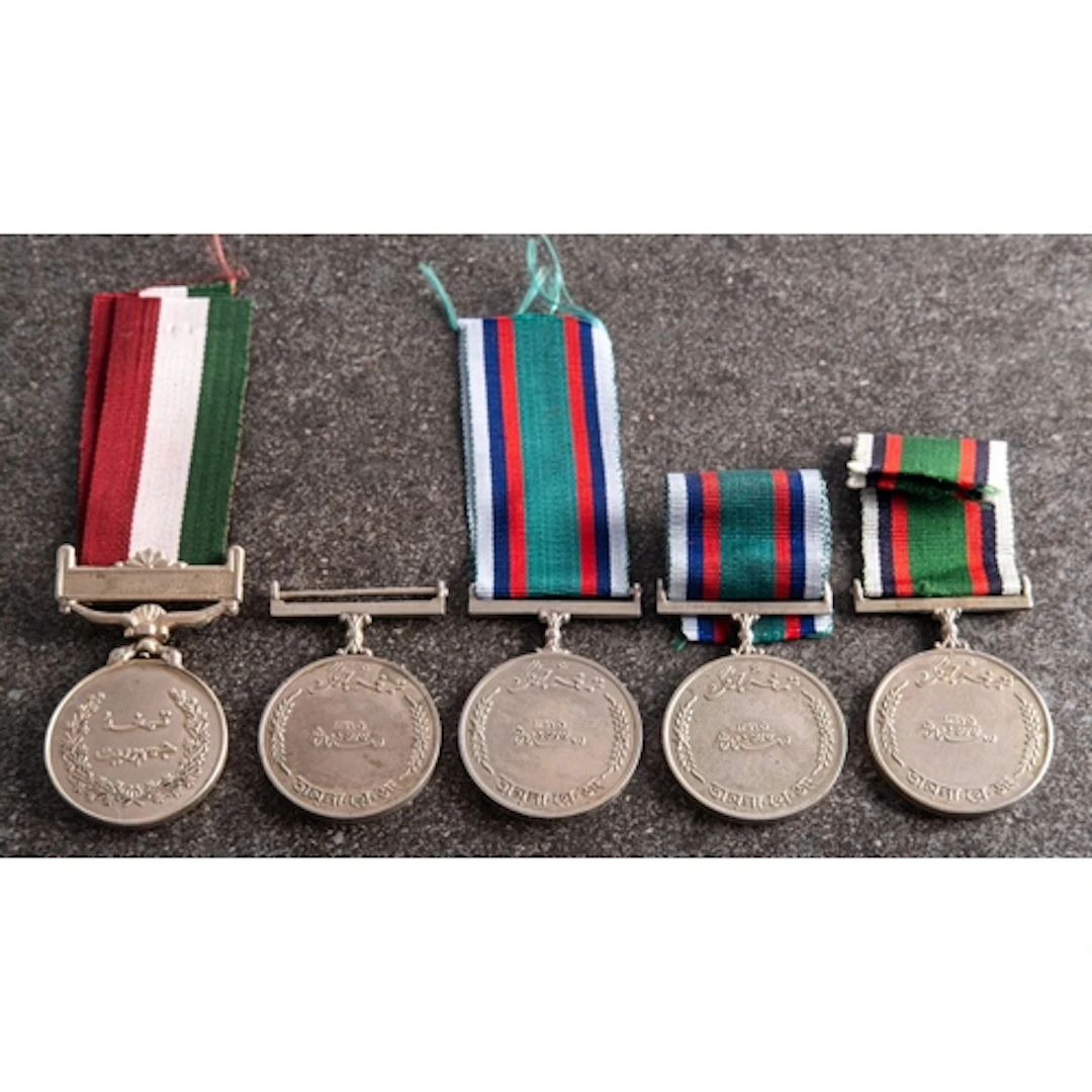 A group of five Pakistan Tamgha-e-Jang (War Medal), one name...