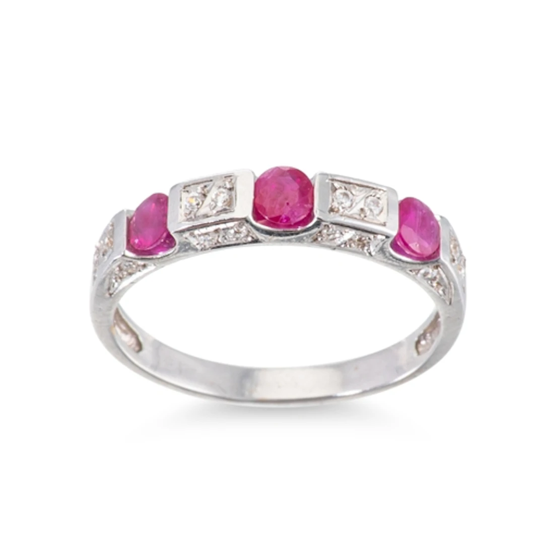 A RUBY AND DIAMOND BAND RING, the alternating ruby & diamond...