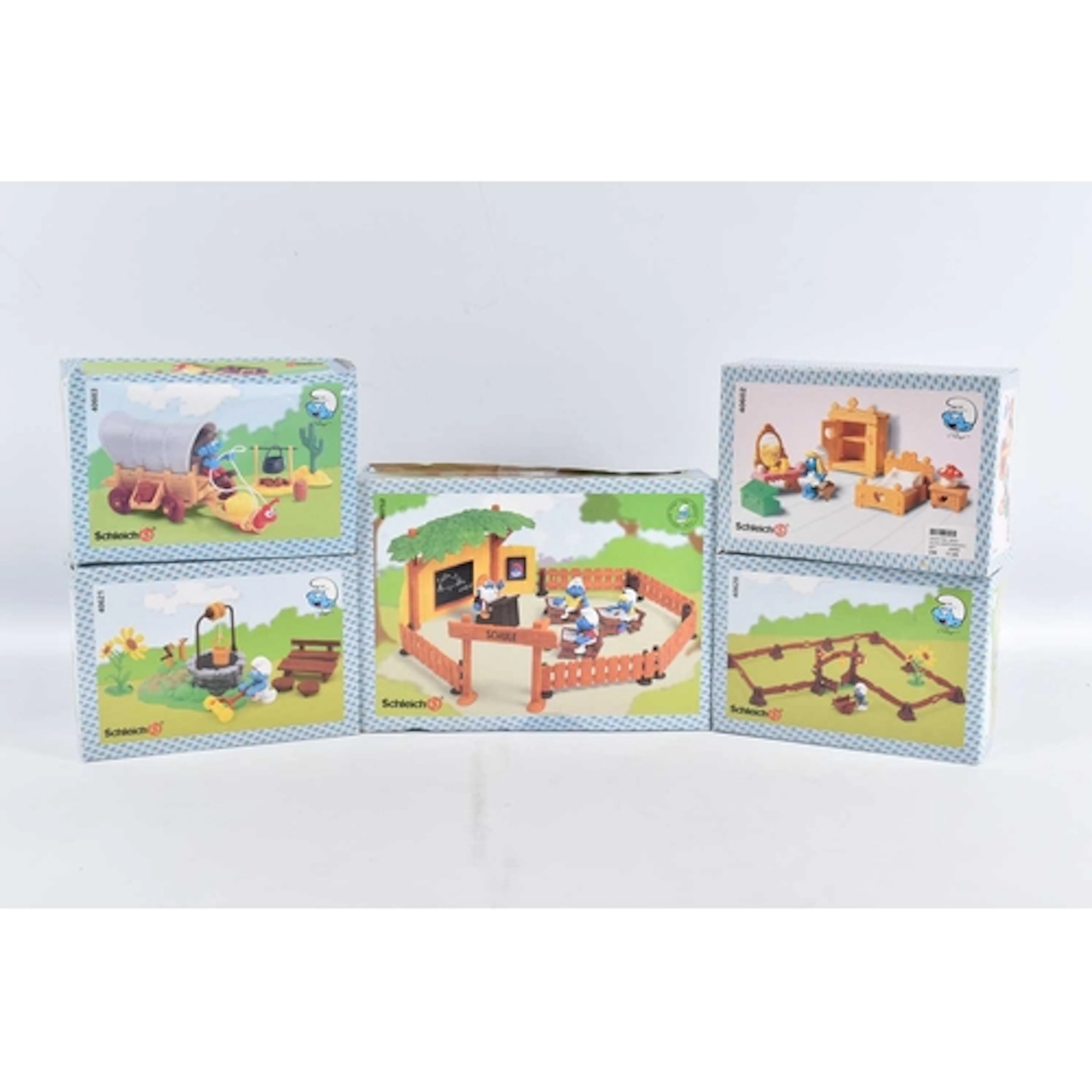 A COLLECTION OF FIVE BOXED SCHLEICH PEYO THE SMURFS PLAYSETS...