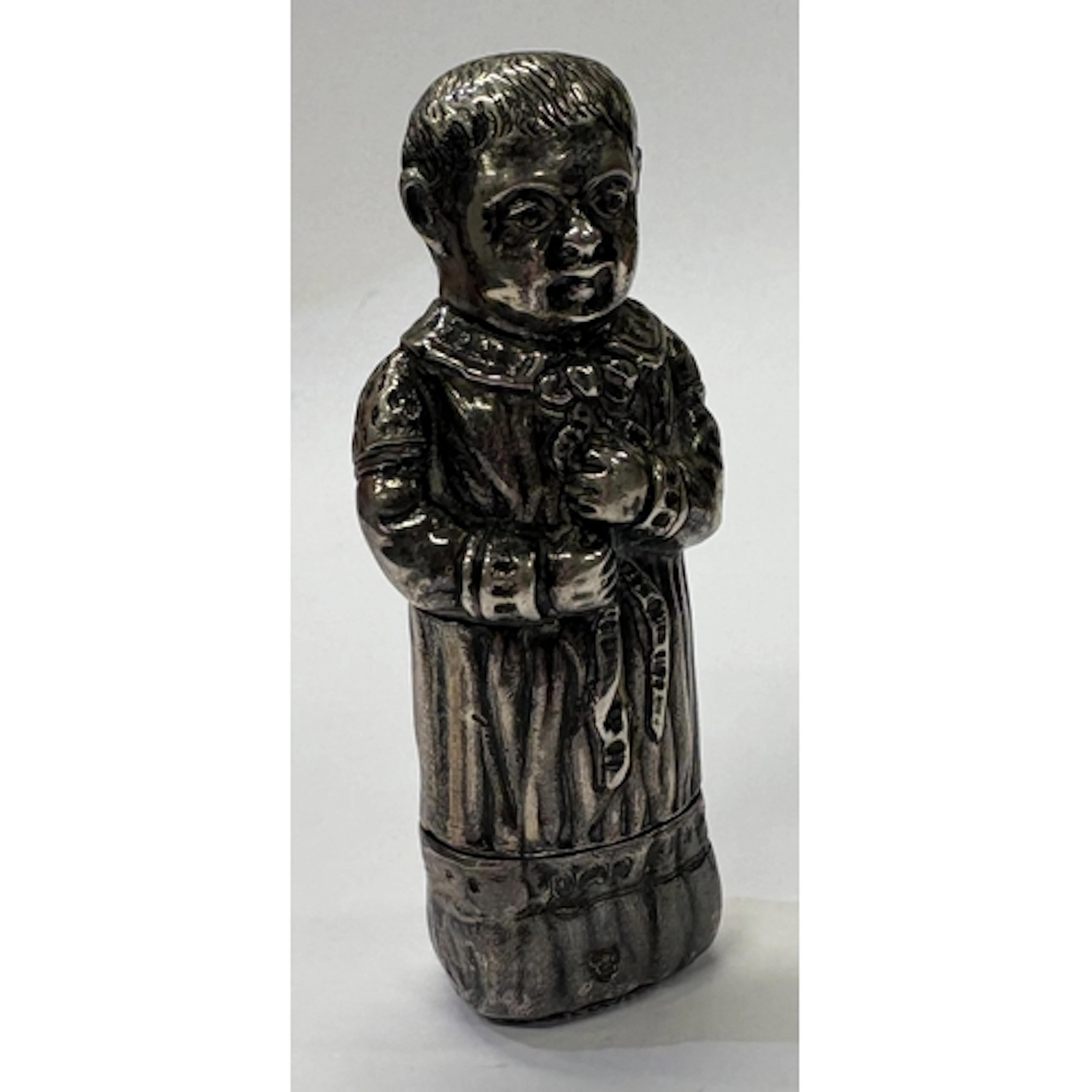 A Victorian silver vesta case in the form of a boy. Bearing ...