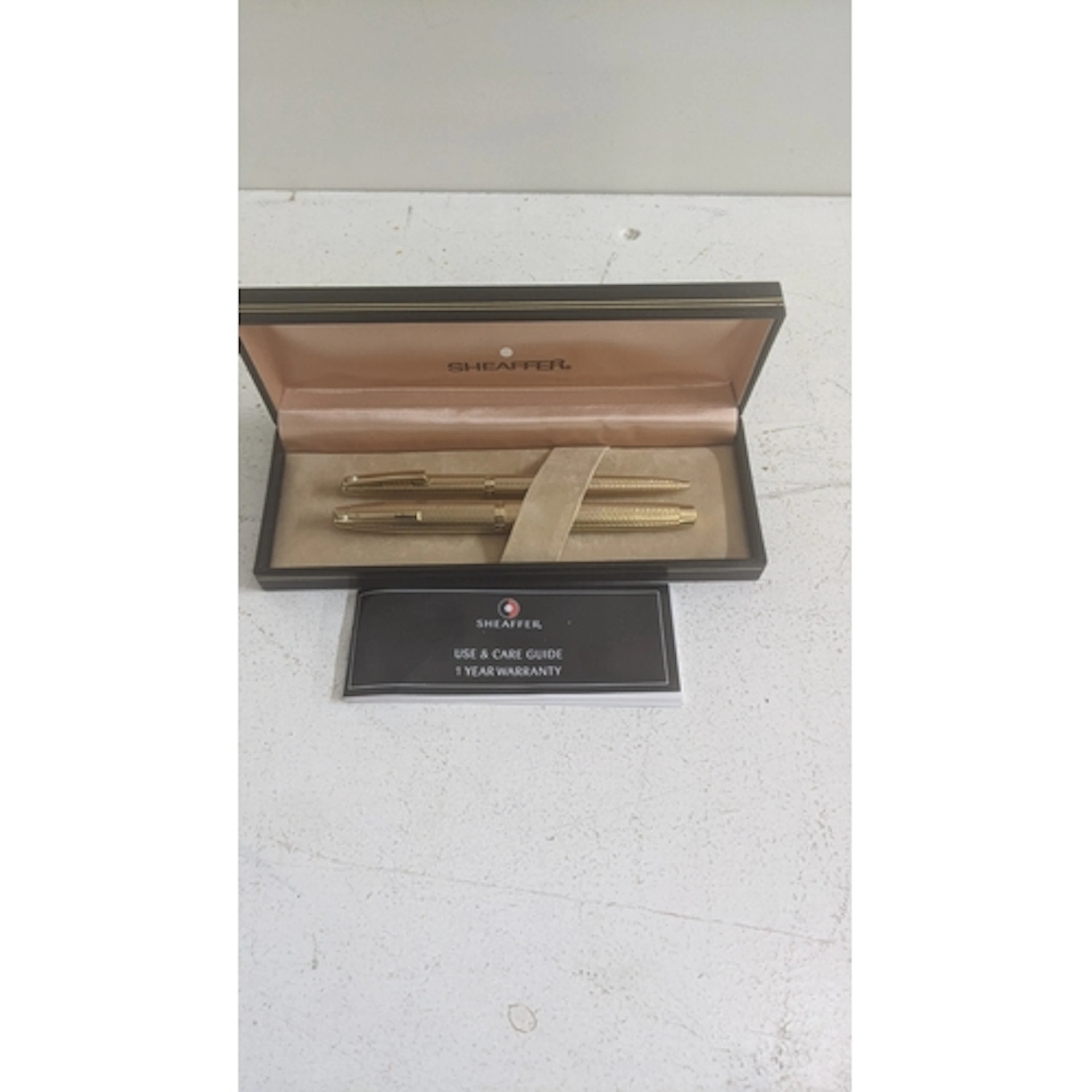 A Shaeffer Targa gold-plated fountain pen and ballpoint pen ...