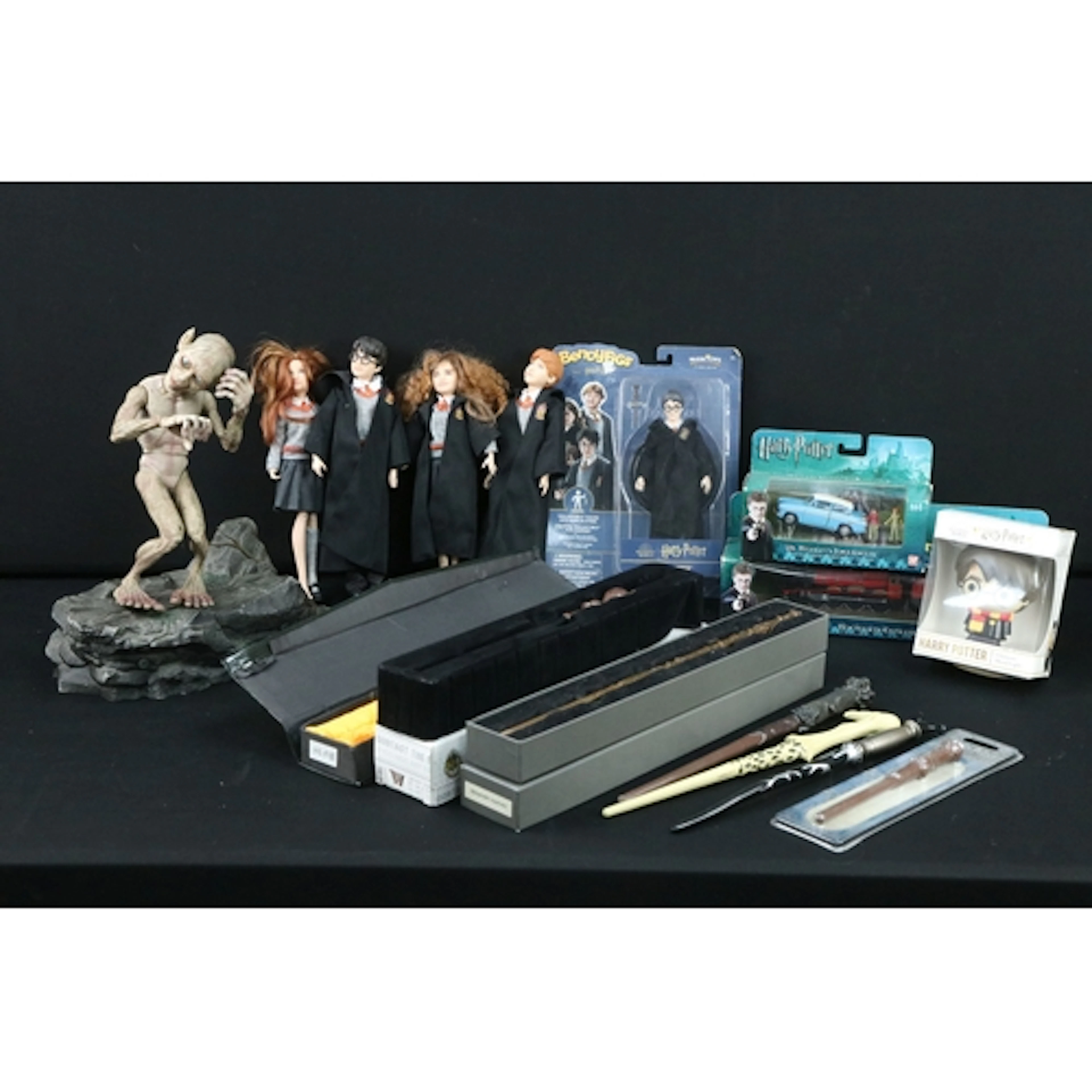 Collection of Harry Potter figures, diecast models and colle...