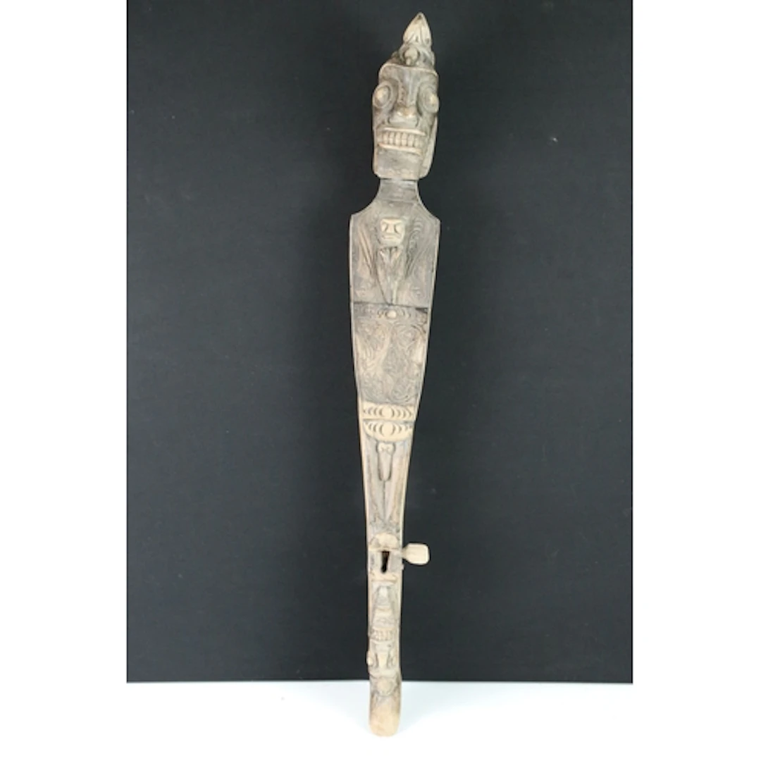 Carved figural Hasapi traditional Indonesian lute, 68.5cm lo...
