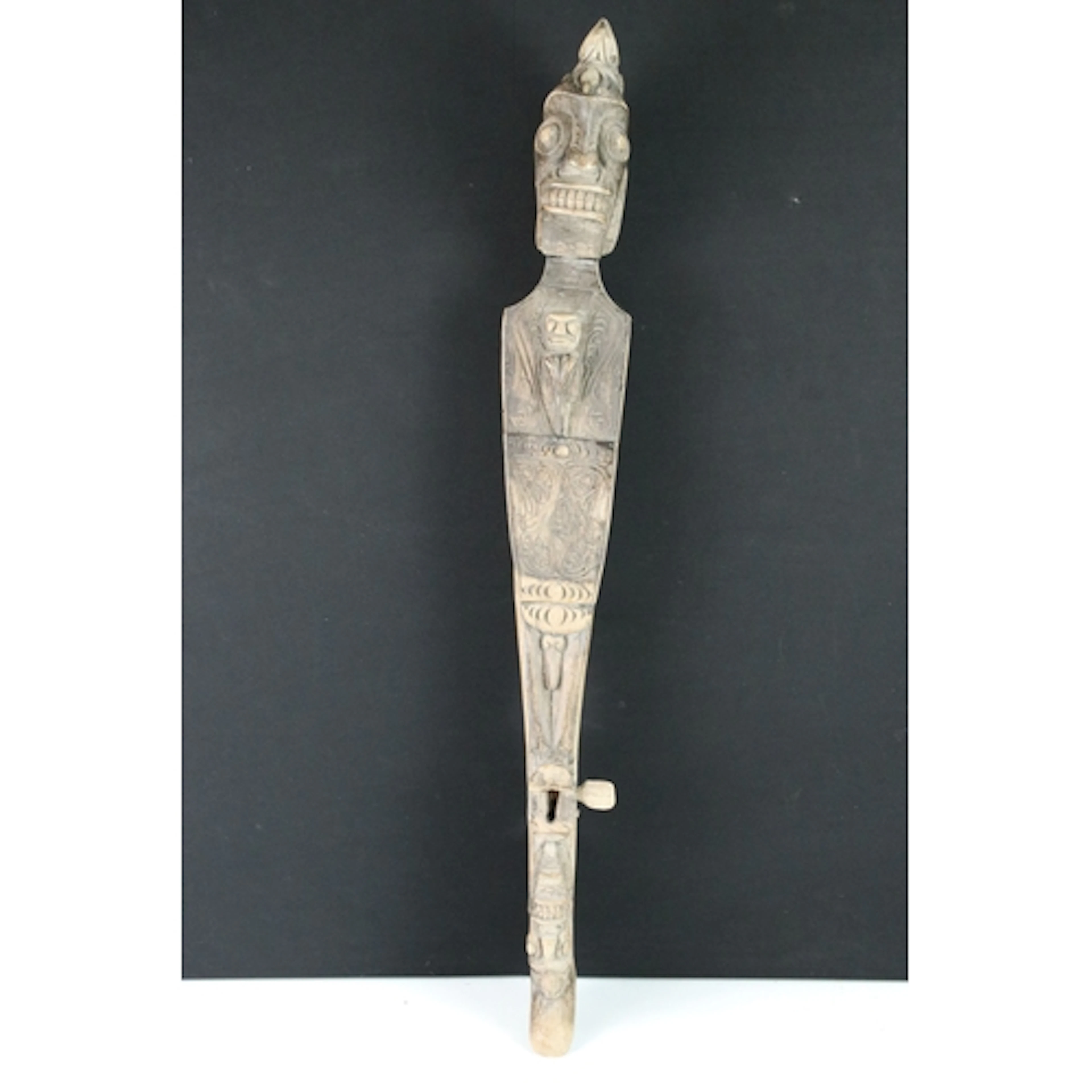 Carved figural Hasapi traditional Indonesian lute, 68.5cm lo...