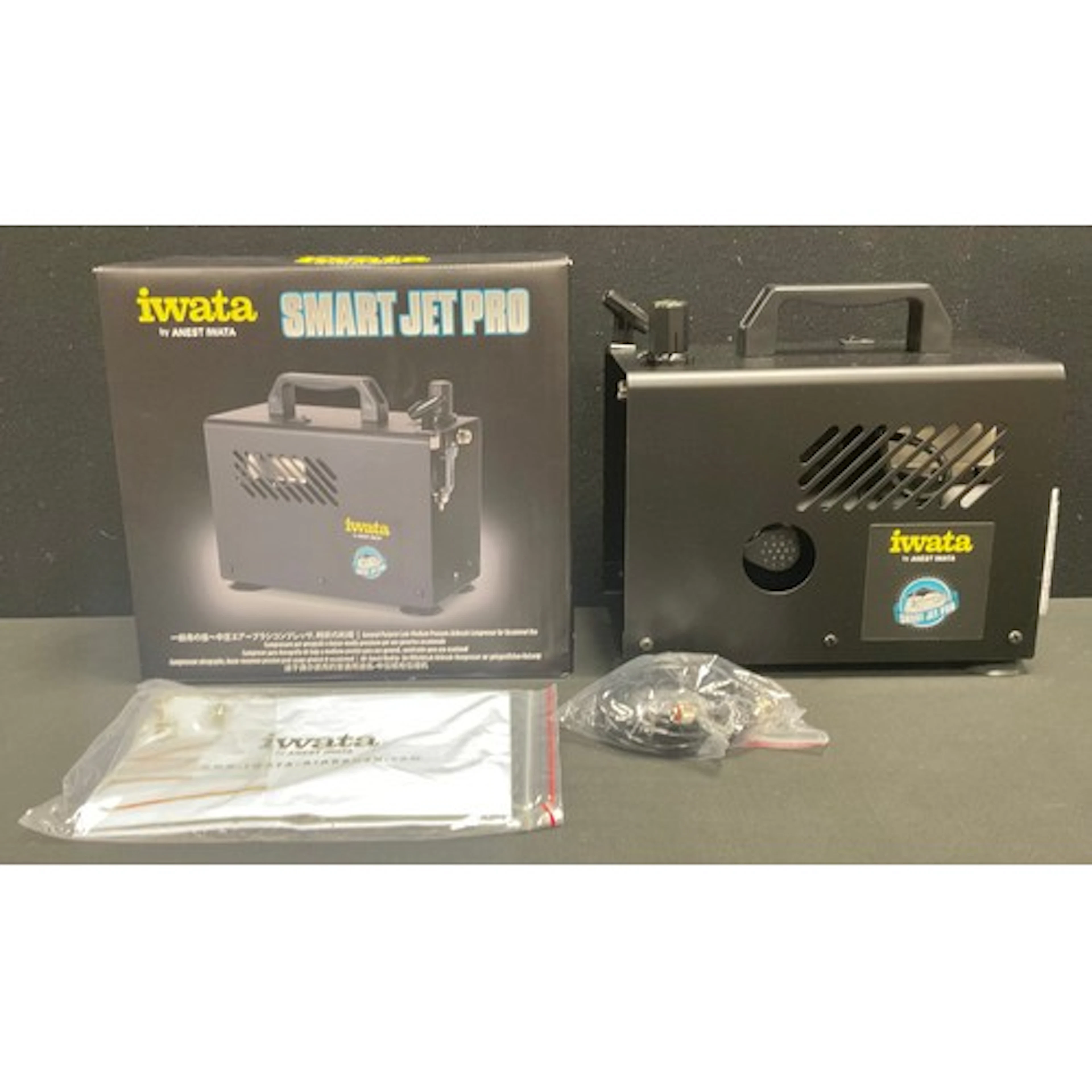 An Iwata Smart Jet Pro pressure airbrush compressor, boxed, ...