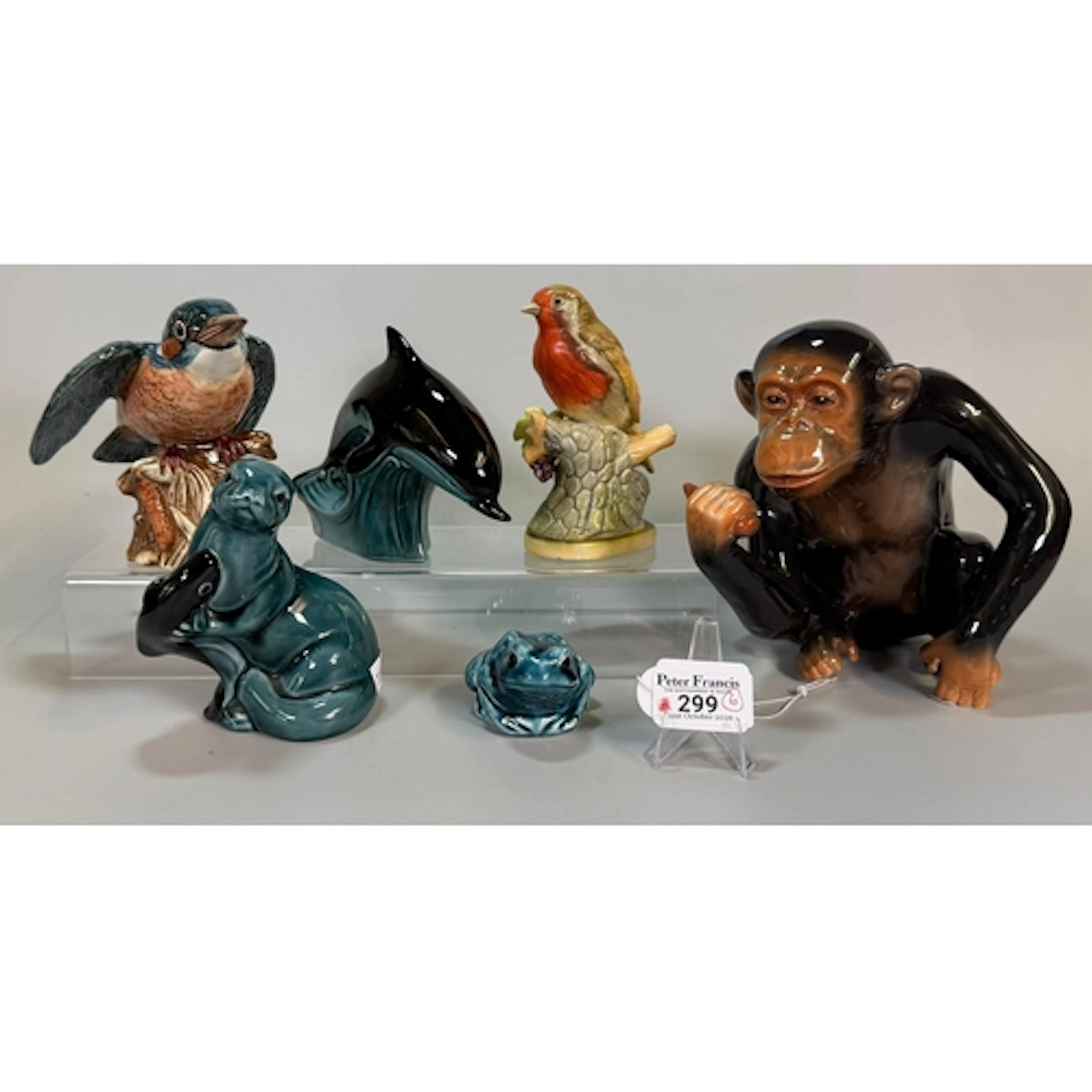 Three Poole Pottery ceramic animals to include: seal, dolphi...