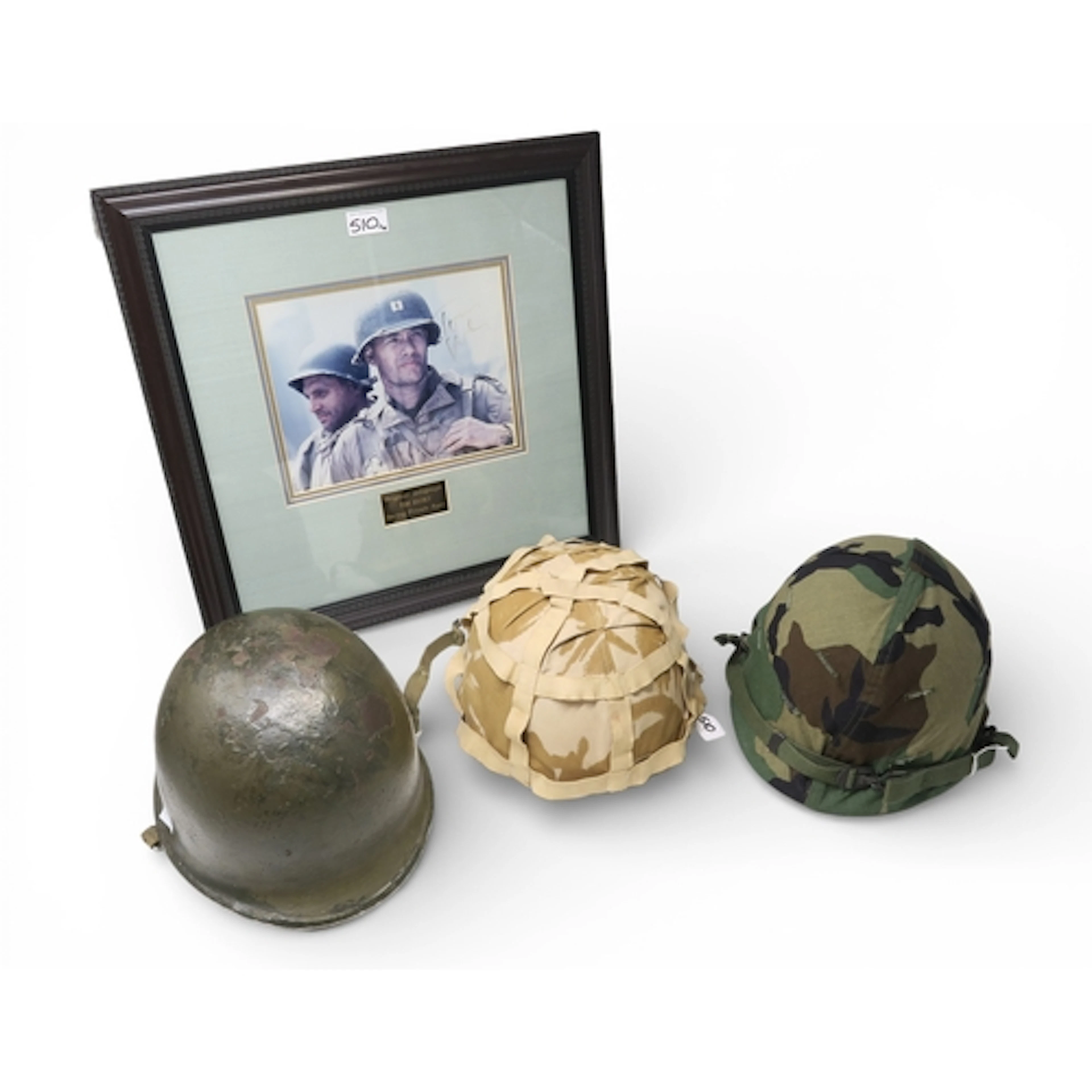 An American M1 pattern steel helmet with fibre liner, togeth...
