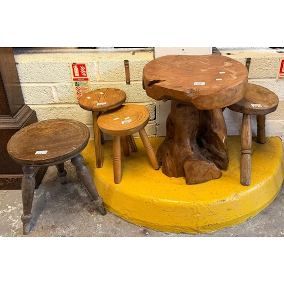 Group of assorted antique and later milking stools, together...